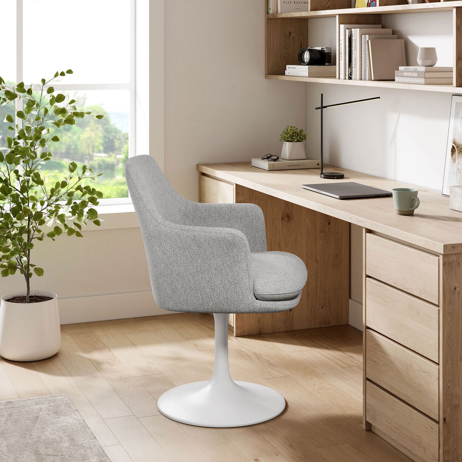 Gray swivel armchair paired with a wooden desk, creating a modern and comfortable home office workspace. || EEI-6956-WHI-HLG || front_angle_room