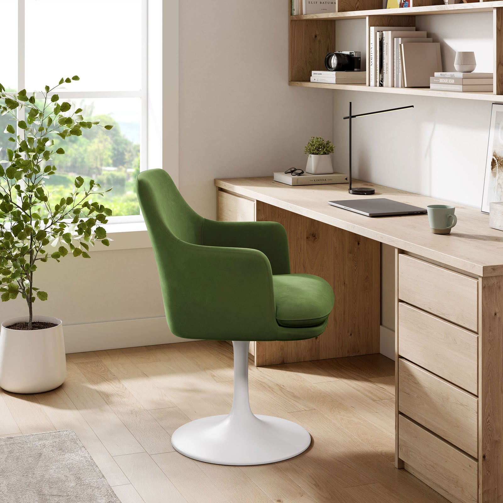 Green velvet swivel armchair paired with a wood desk in a bright modern home office || EEI-6957-WHI-MOG || side_room