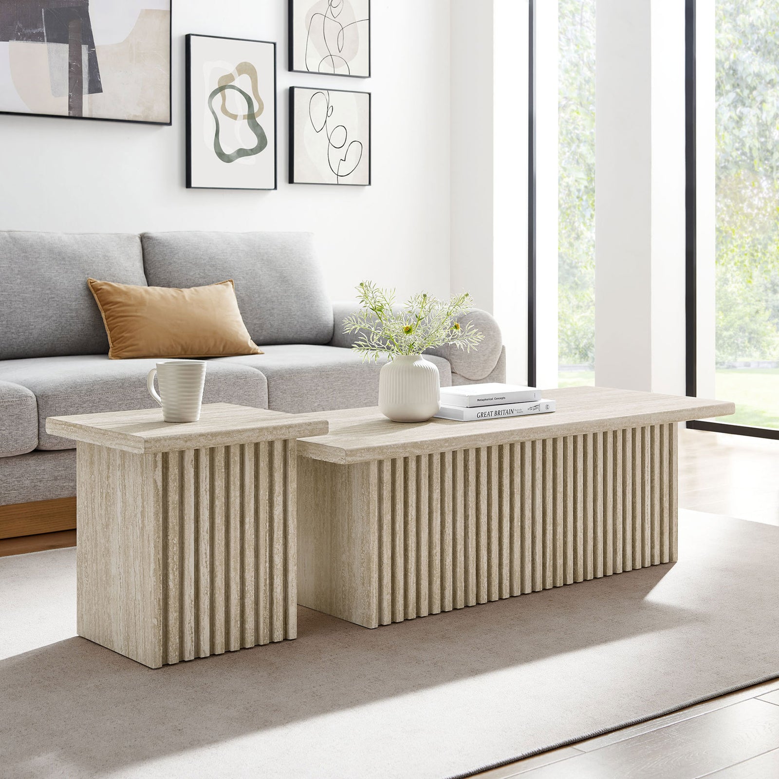 Stone-look nesting tables bring mid-century lines and practical layers to a bright, modern living room || EEI-6970-TRA || front_angle_room
