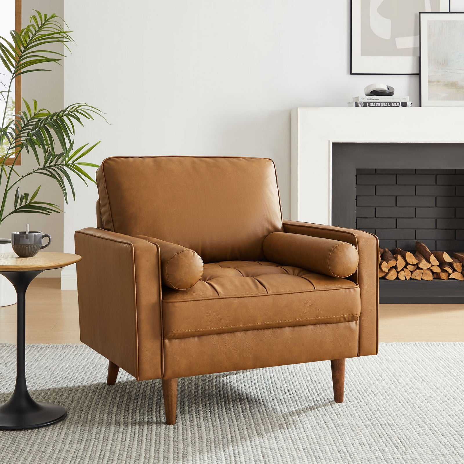 Inviting tan vegan leather accent chair with biscuit tufting and mid-century tapered legs || EEI-6971-TAN || front_angle_room