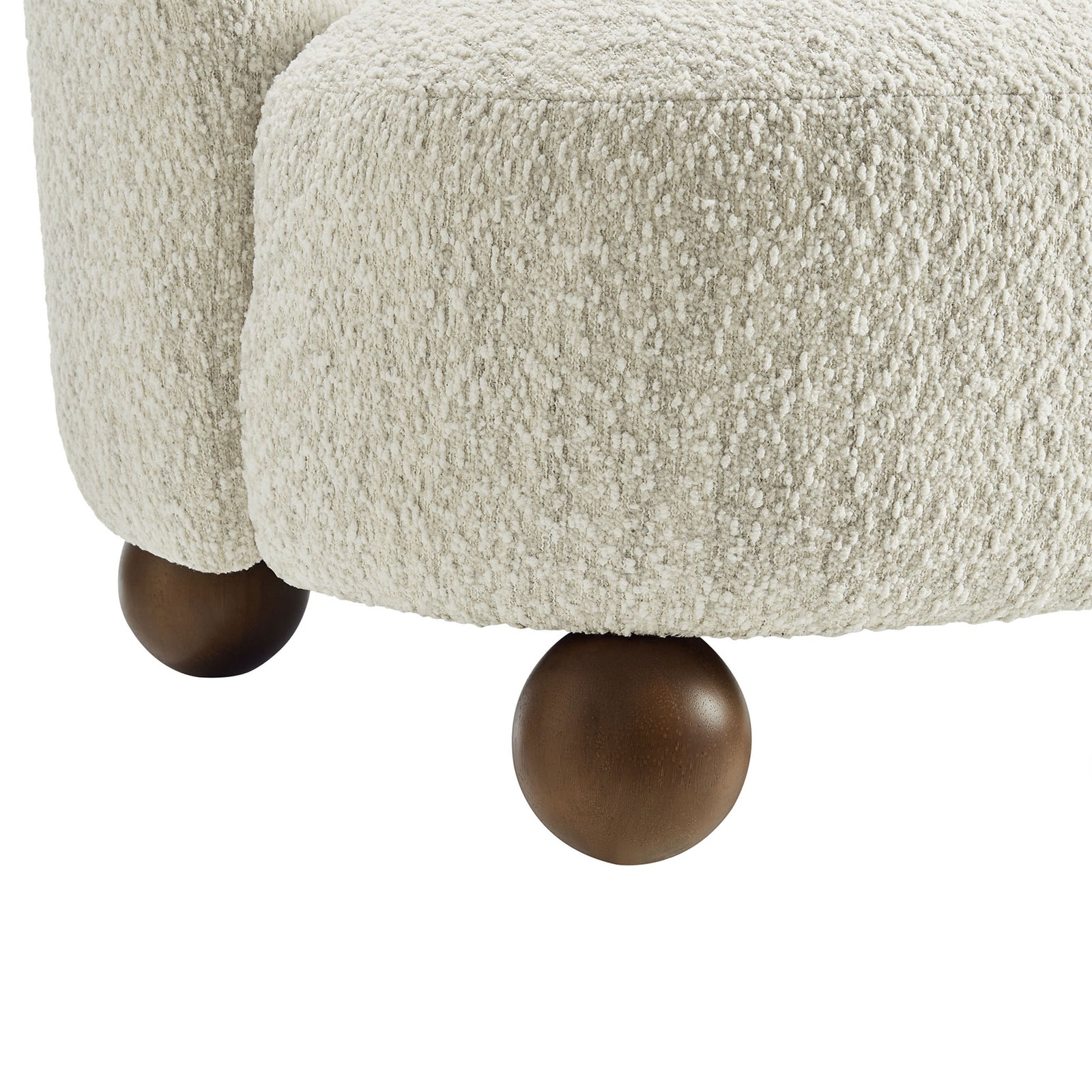 Walnut-finish ball feet and thick, nubby boucle upholstery deliver tactile style. || EEI-6989-PRL-WAL || leg_studio