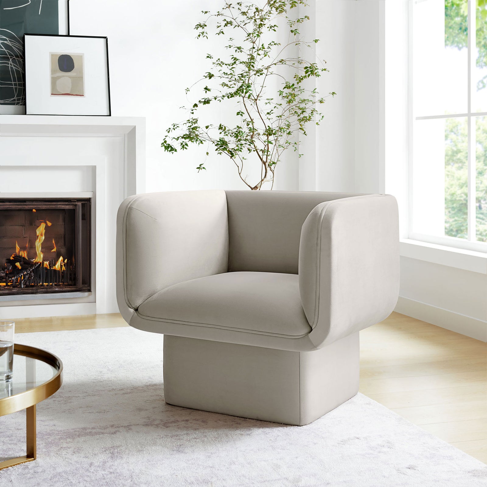 Almond velvet chair elevates the living room with cozy cushioning and clean, contemporary lines || EEI-6995-ALM || front_angle_room