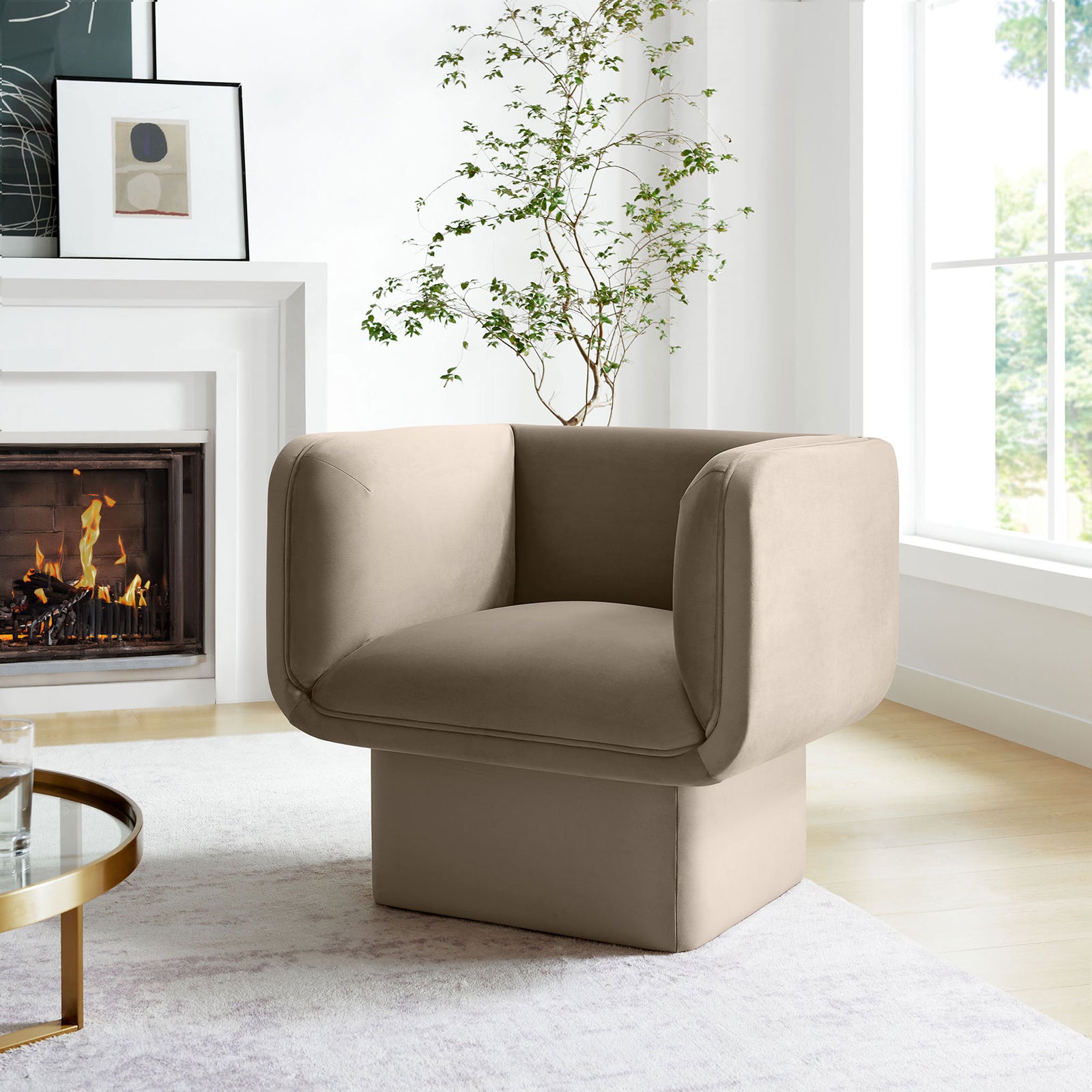 Elevate living spaces with a cube-base accent chair wrapped in soft, stain-resistant taupe velvet. || EEI-6995-TAU || front_angle_room