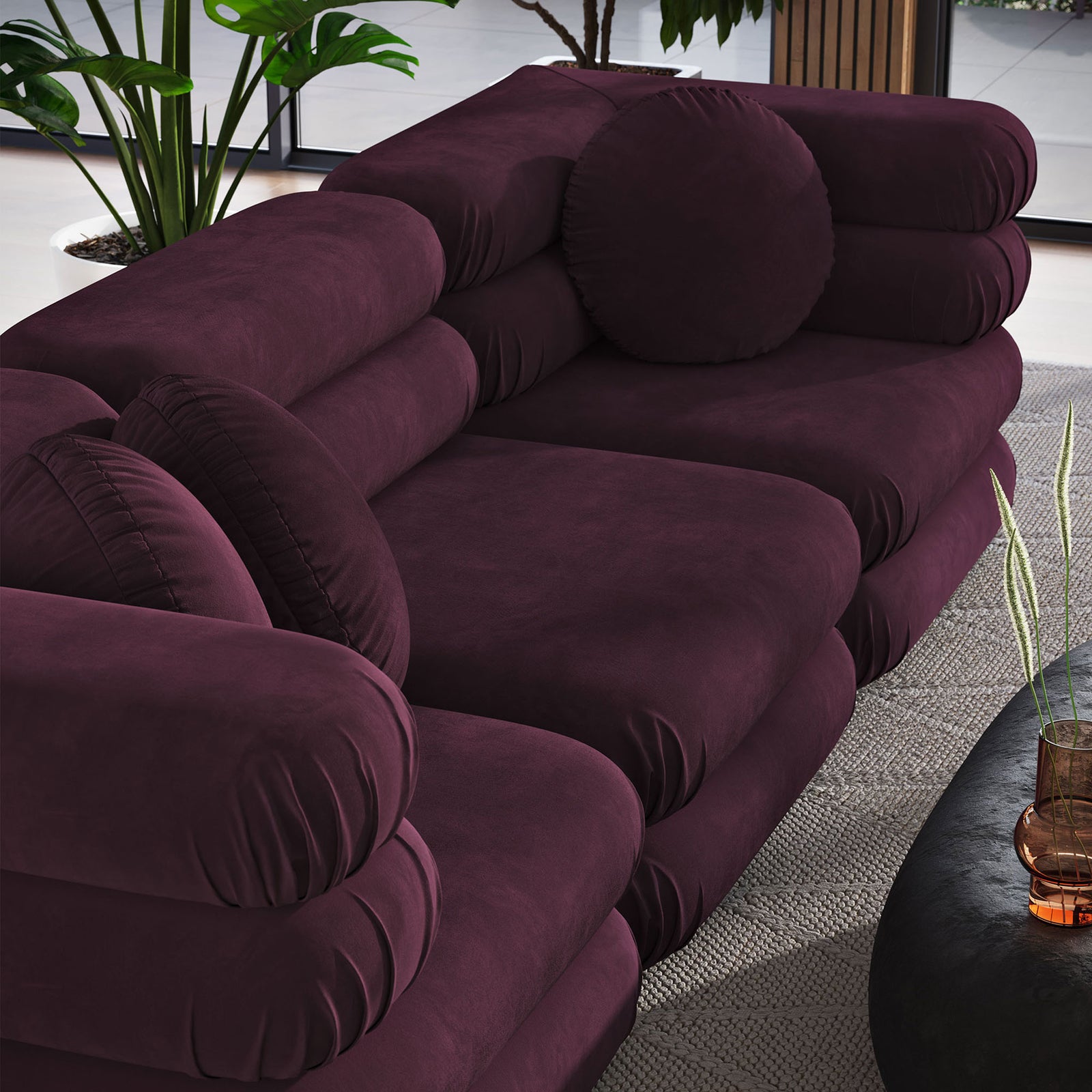 Sumptuous mulberry velvet cushions with layered bolstered profile and round pillows for a cozy, wrapped-in feel || EEI-7003-MUL || detail_room