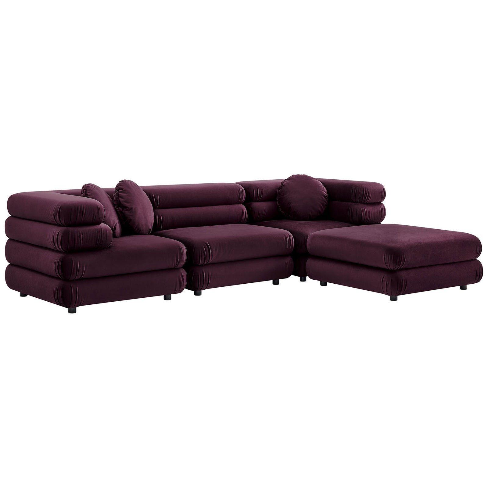 Layered cylindrical cushions and plush mulberry velvet create a sculptural modular sectional with generous chaise || EEI-7004-MUL || front_angle_studio