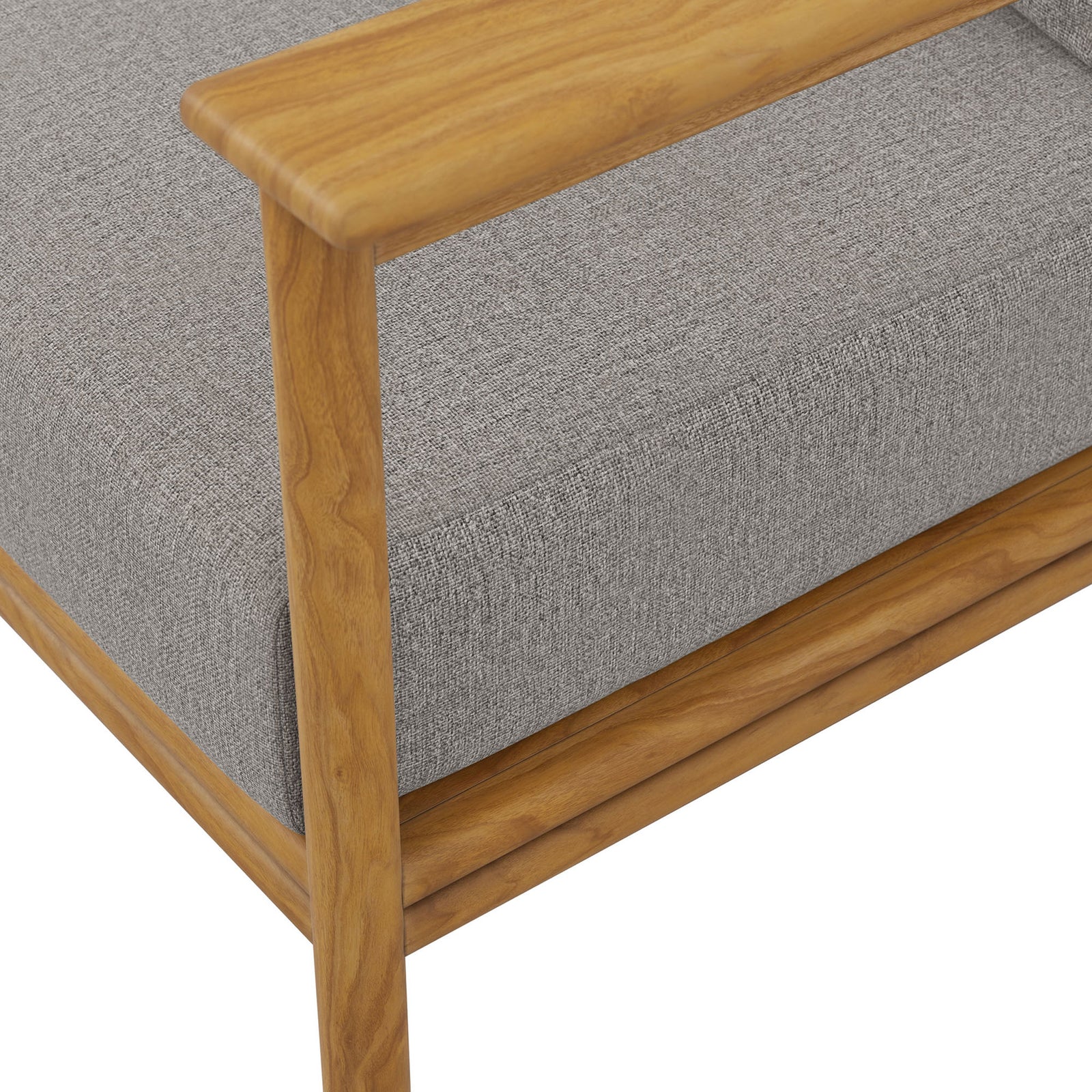 Smooth teak armrest meets textured light gray seat cushion for a refined outdoor sofa detail. || EEI-7008-NAT-DRI || detail_studio