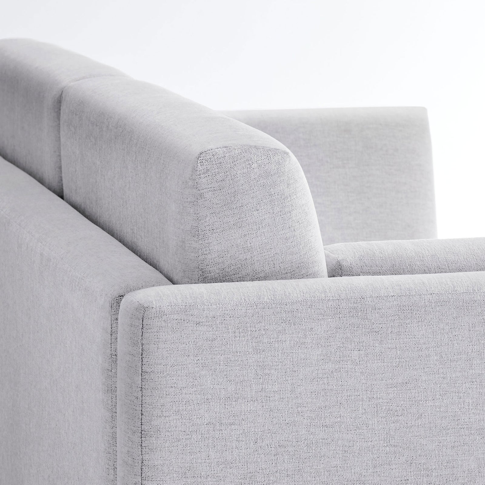 Heathered chenille fabric and neatly tailored seams highlight the sofa's soft, textured finish || EEI-7012-NPT || detail_studio