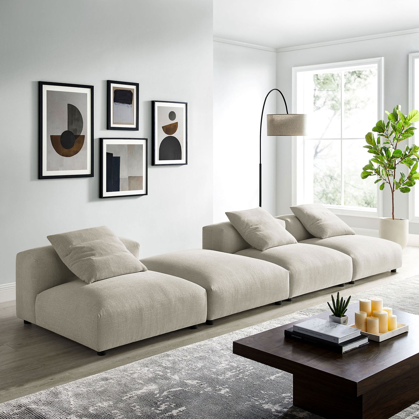 Modern living room featuring the linen modular sectional sofa with four plush seats and loose back pillows || EEI-7027-LIN || front_angle_room