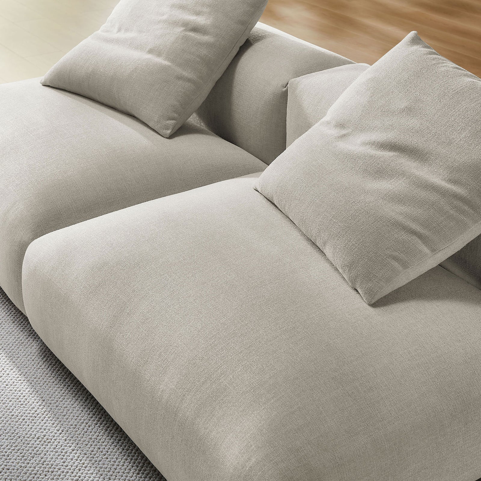 Close-up of linen upholstery and plush cushions highlighting the soft textured weave and generous seat depth || EEI-7037-LIN || swatch_room