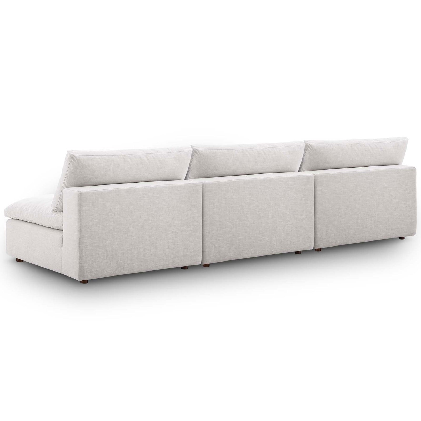 Beige sectional sofa shown from the back with smooth upholstery and a low-profile base on wood feet. || EEI-7043-BEI || back_angle_studio