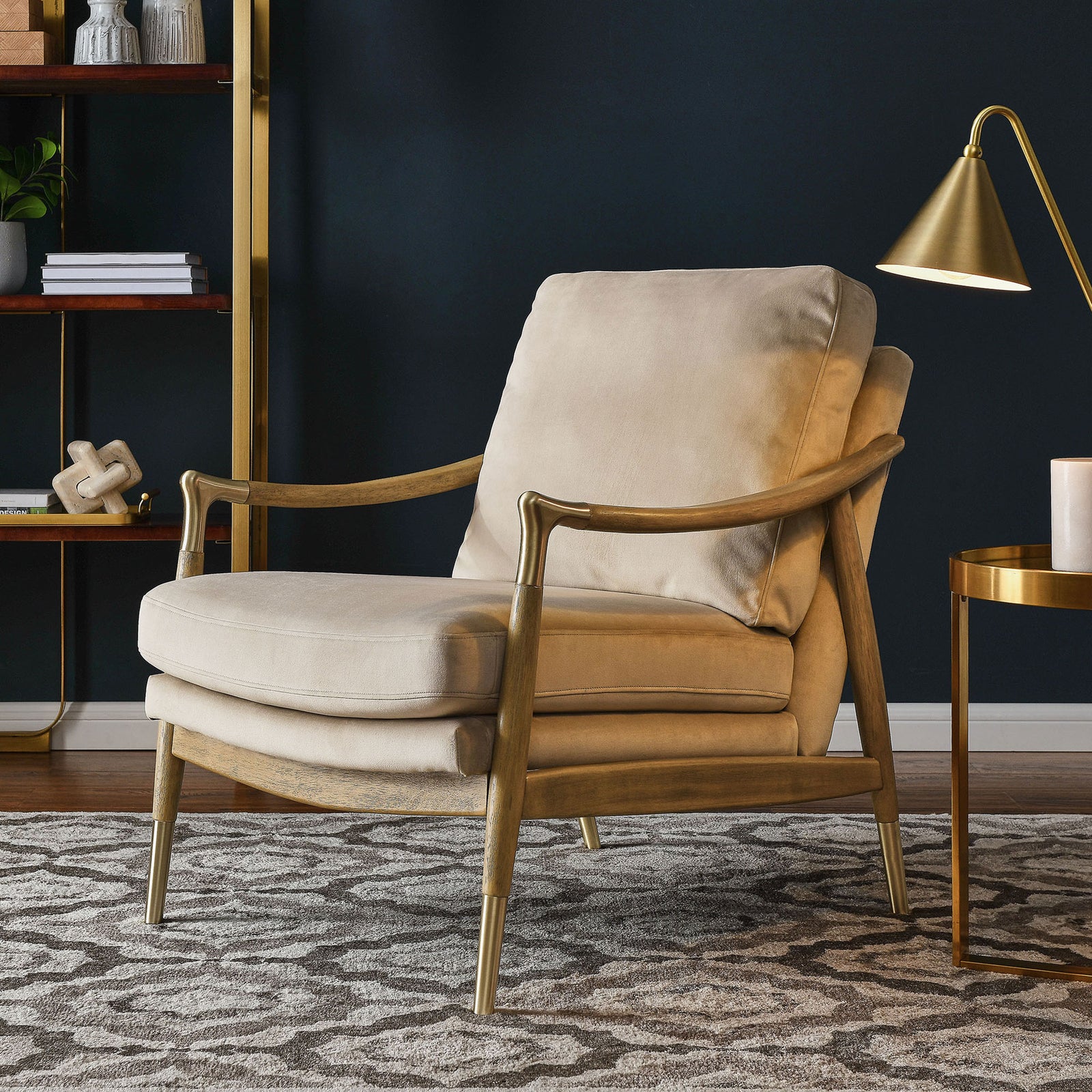 Almond velvet armchair warms the room with walnut wood accents and brass-capped legs for understated elegance || EEI-7056-ALM-WAL || front_angle_room