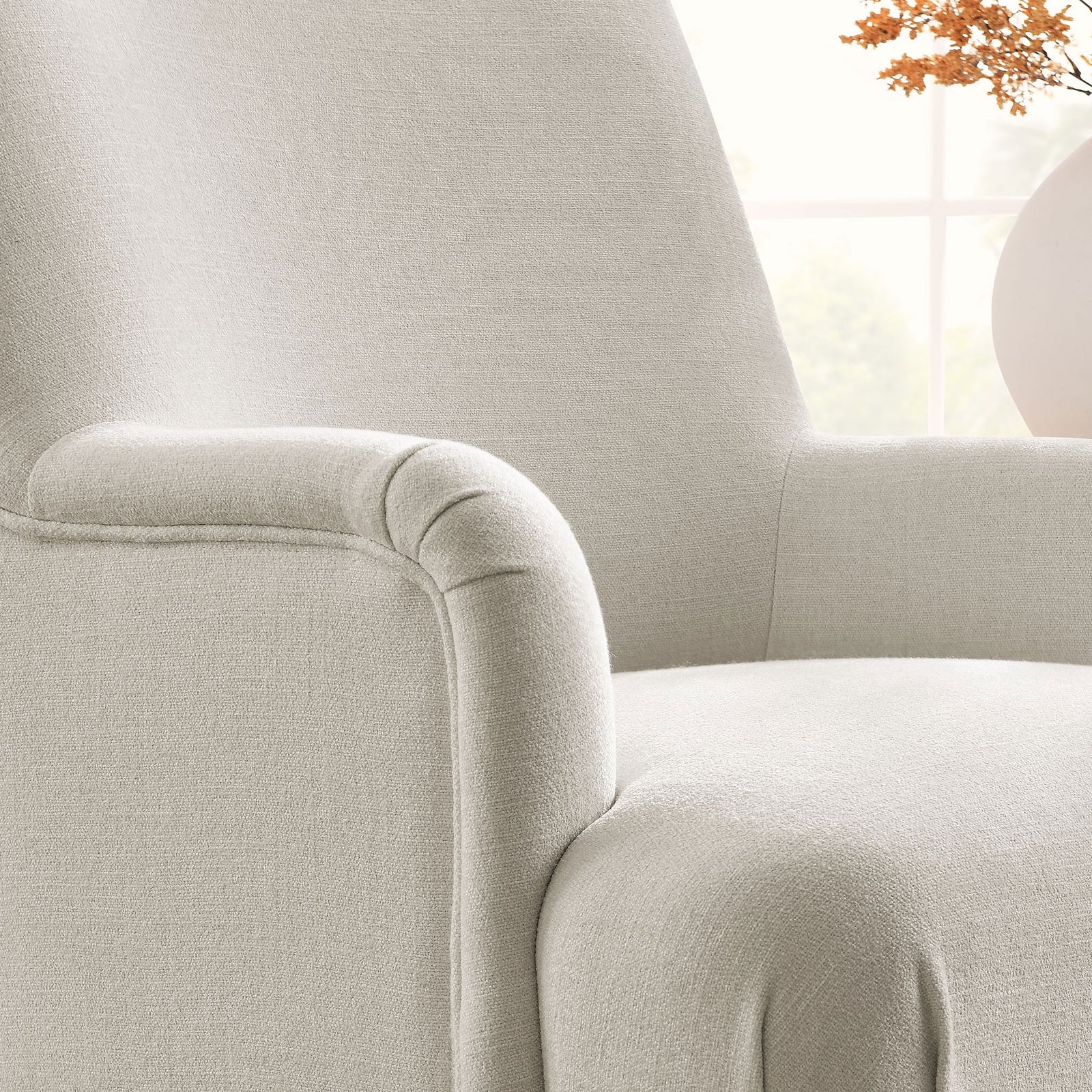 Textured salt fabric and neatly sewn piping offer tactile comfort and lasting style. || EEI-7057-SAL || detail_room