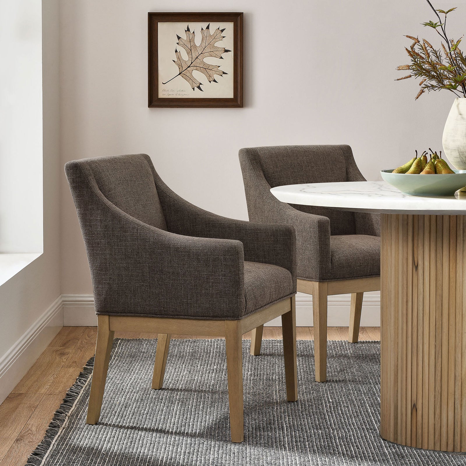 Mocha dining armchairs styled around a round table in a bright contemporary dining room || EEI-7058-MOC-NAT || front_angle_room