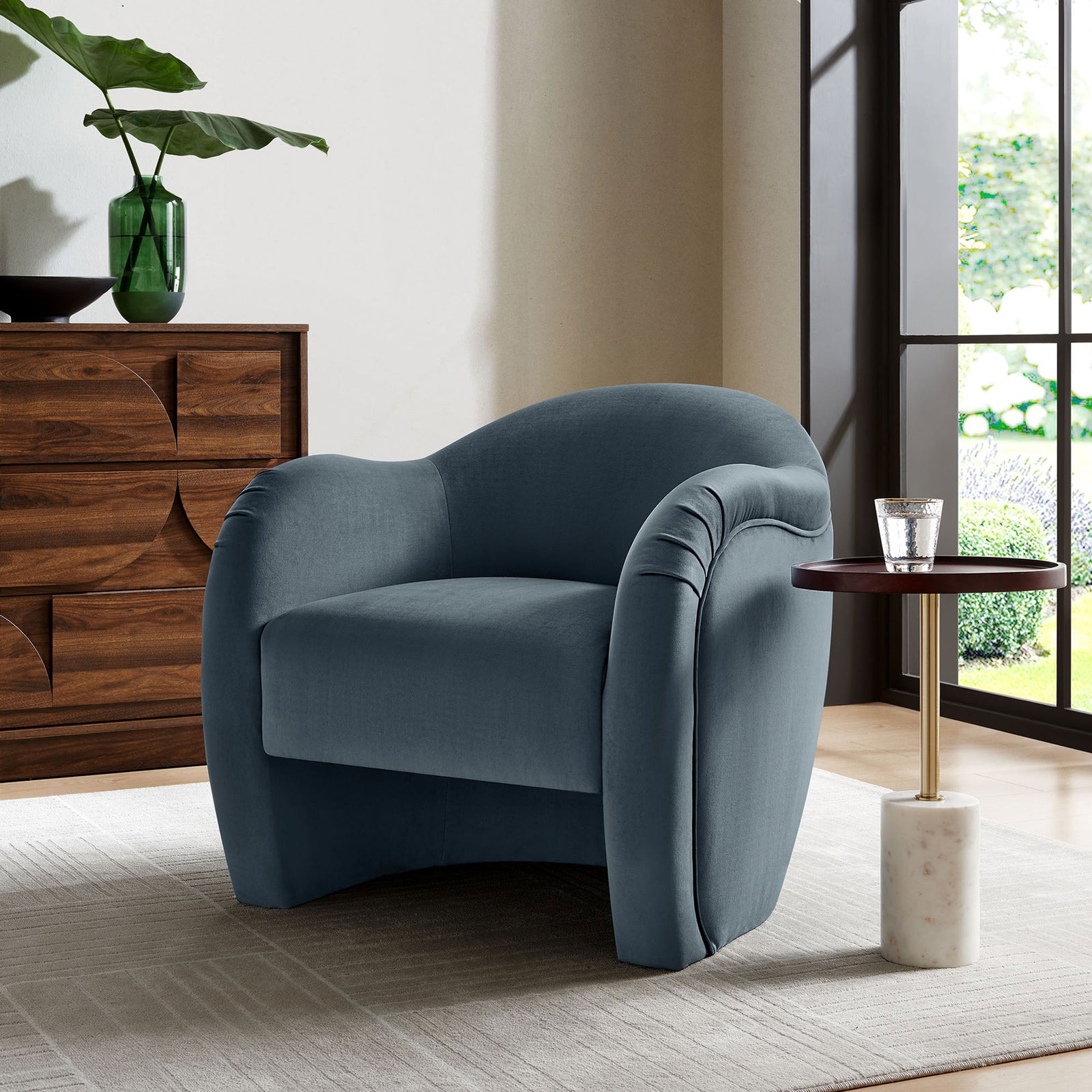 Inviting lounge chair brings soft cadet blue velvet and cozy curves to your living space || EEI-7074-CAB || front_angle_room