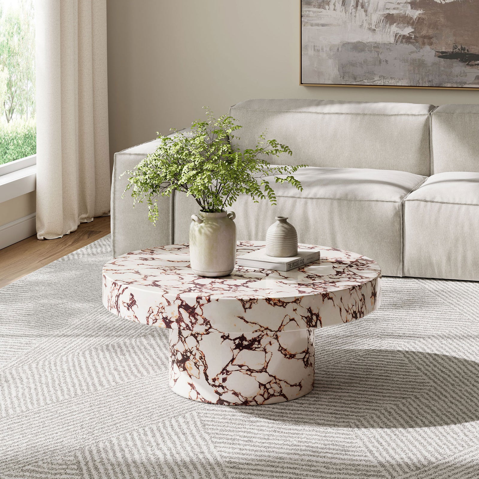 Red marble effect round coffee table grounding a modern neutral living room seating area || EEI-7091-RED || front_angle_room