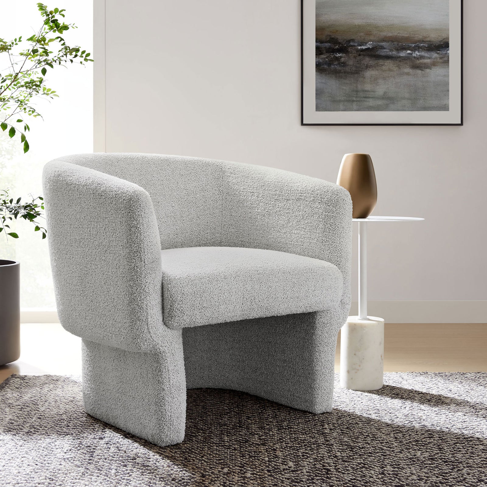 Barrel accent chair adds soft texture and modern warmth to living spaces with its boucle upholstery. || EEI-7100-NPT || front_angle_room