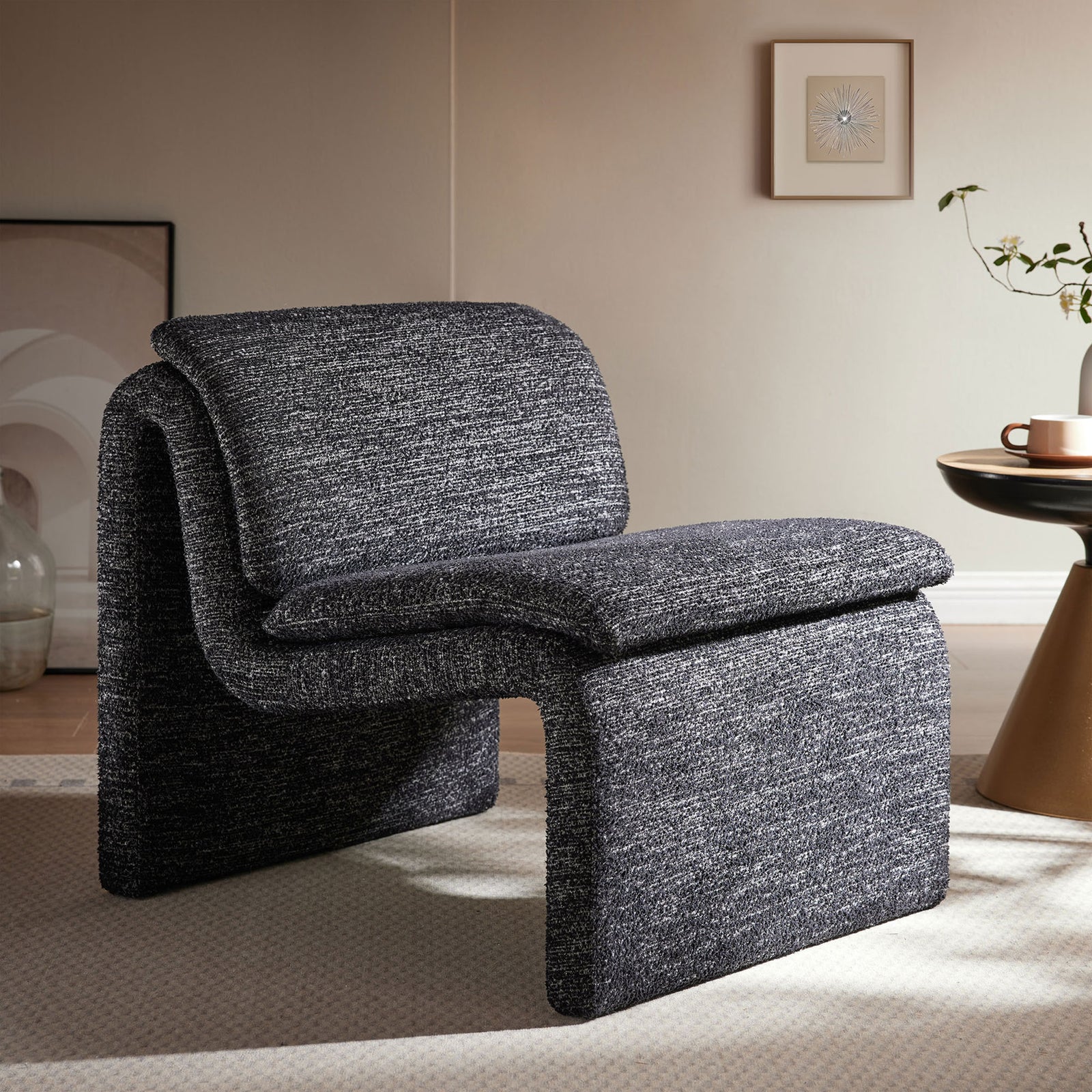 Statement armless chair elevates the room with cozy boucle, rounded lines, and inviting comfort. || EEI-7103-CHA || front_angle_room