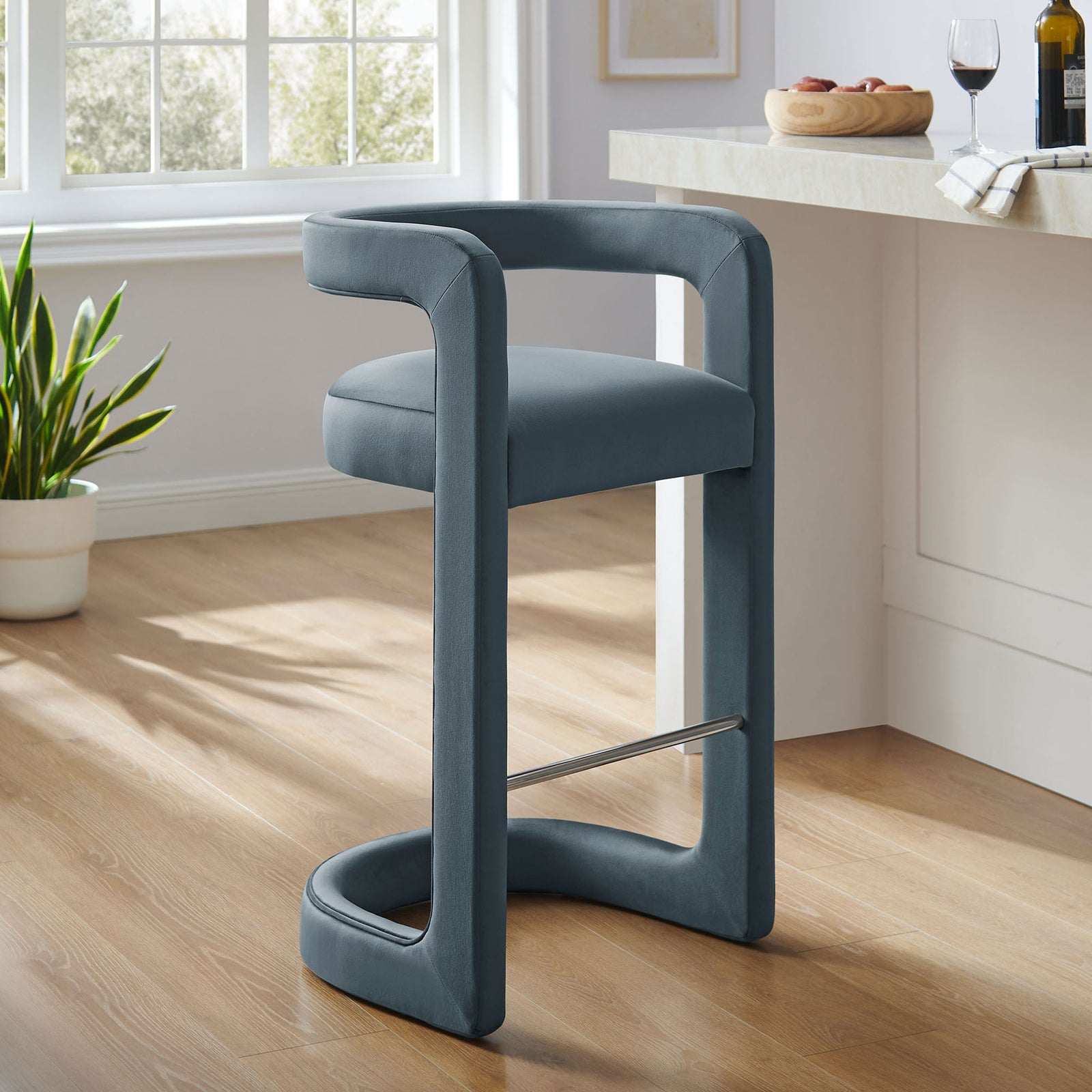 Velvet bar stool accentuates the kitchen with modern curves and cadet blue color || EEI-7108-CAB || front_angle_room