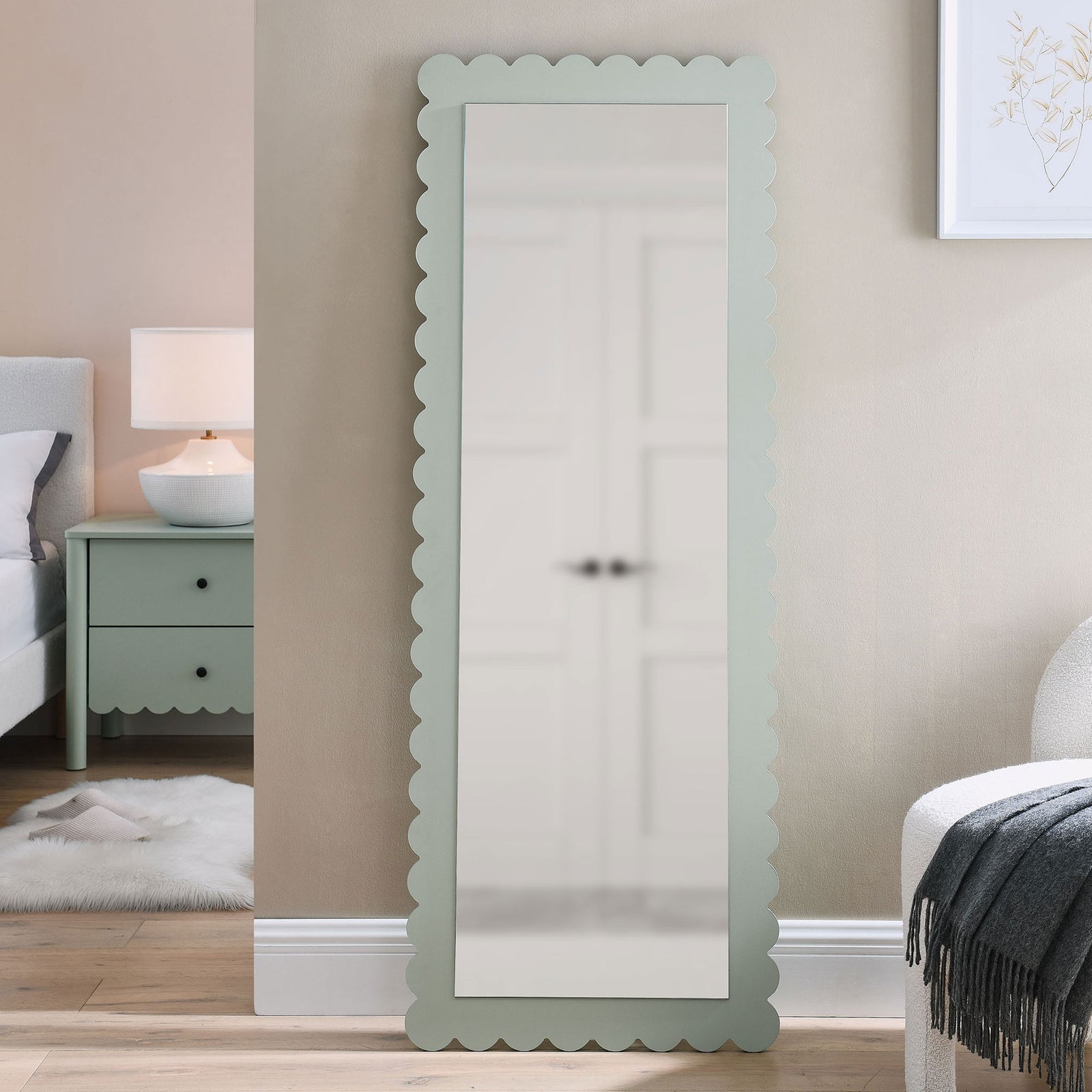 Sage scalloped floor mirror styling a cozy bedroom with coordinating modern nightstand || EEI-7117-SGE || front_room