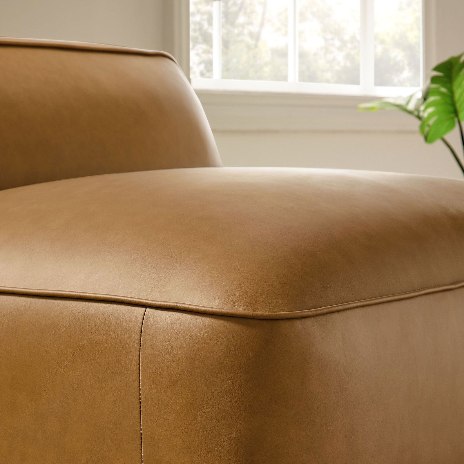 Softly rounded seat and premium vegan leather create a smooth, tailored look with everyday comfort || EEI-7121-CAM || detail_room