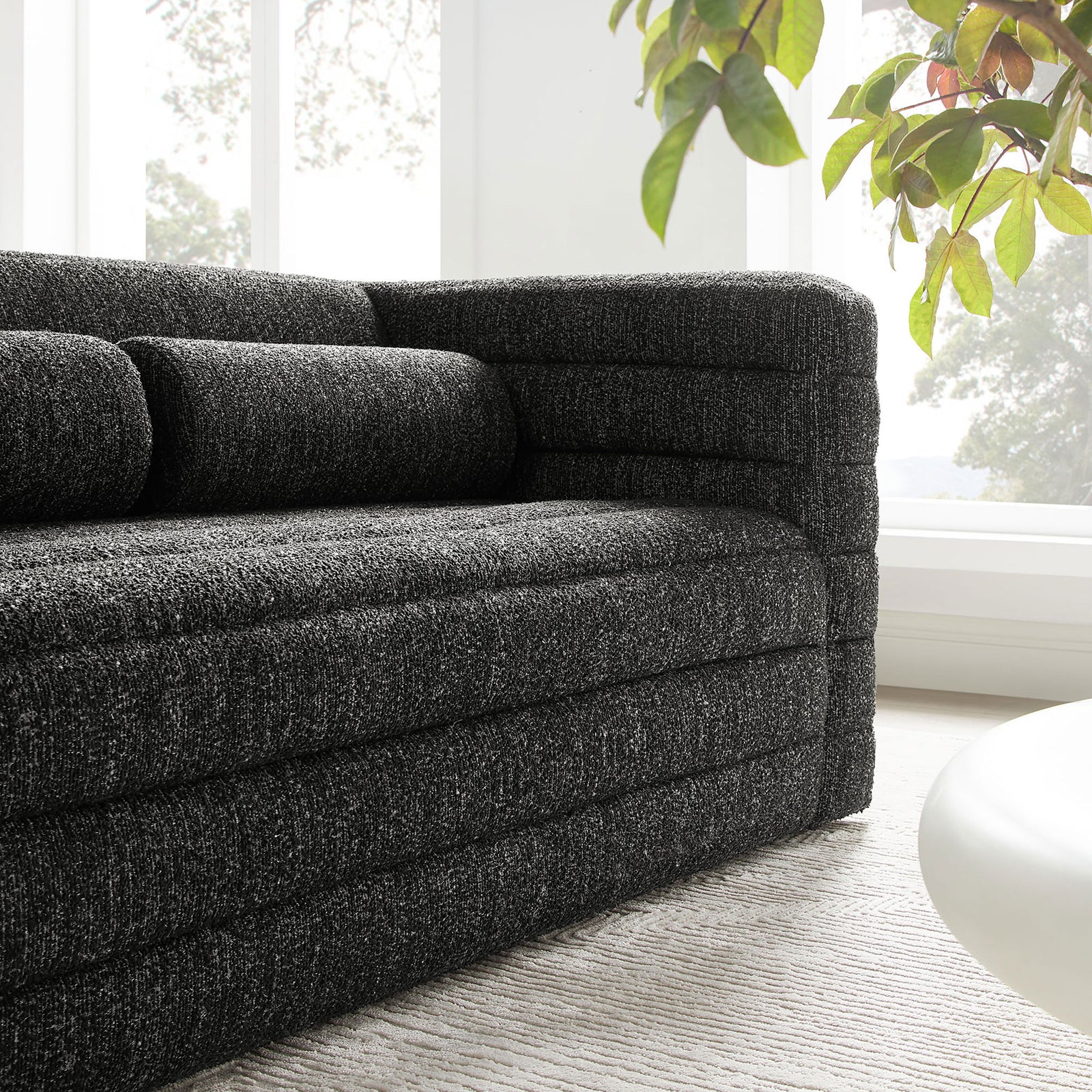 Boucle loveseat adds inviting texture and modern comfort to a bright living room || EEI-7137-CHA || detail_room