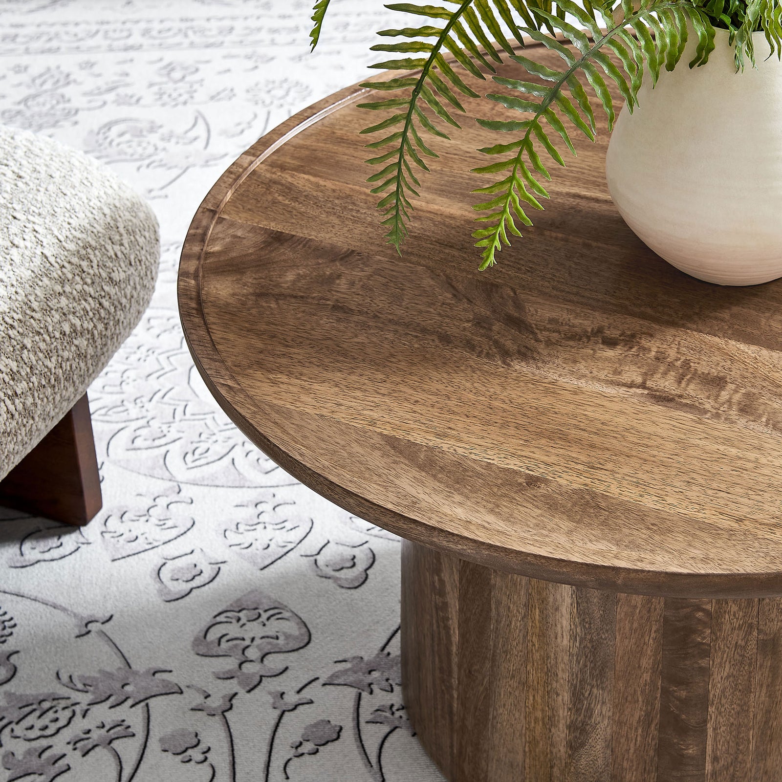 Styled tabletop detail with natural wood grain, showing the refined rim and warm walnut tone || EEI-7144-WAL || detail_room