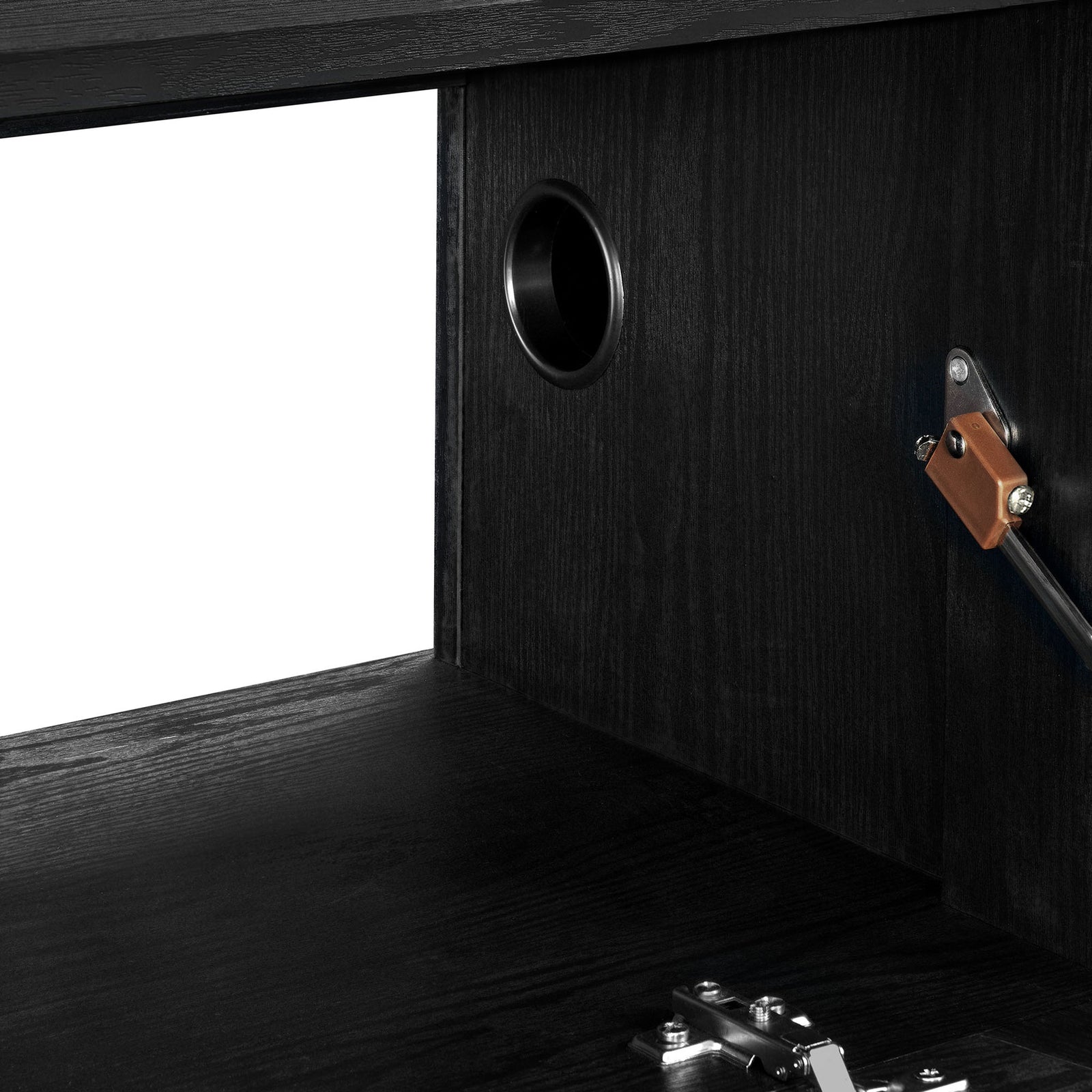 Black TV cabinet interior showing cable management grommet and durable laminate finish || EEI-7164-BLK || storage_open_studio