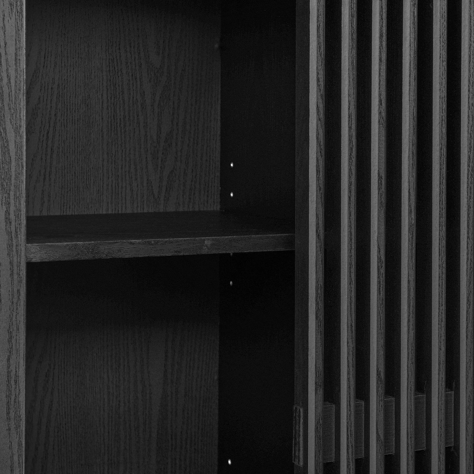 Adjustable interior shelf and slatted door detail on the black arched cabinet. || EEI-7167-BLK || storage_open_studio