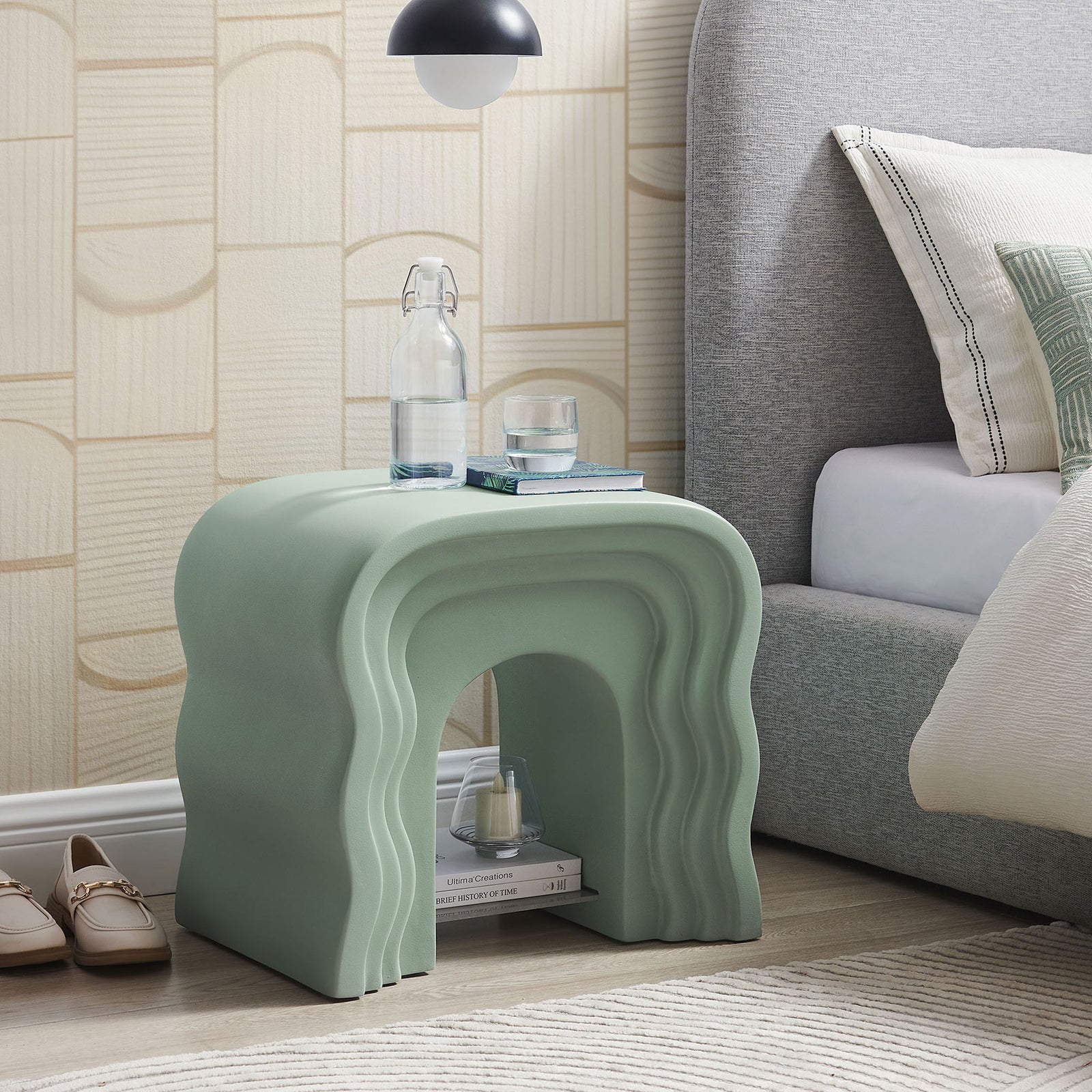Sage green squiggle side table used as a nightstand with acrylic shelf for bedside storage and decor || EEI-7171-SGE || front_angle_room