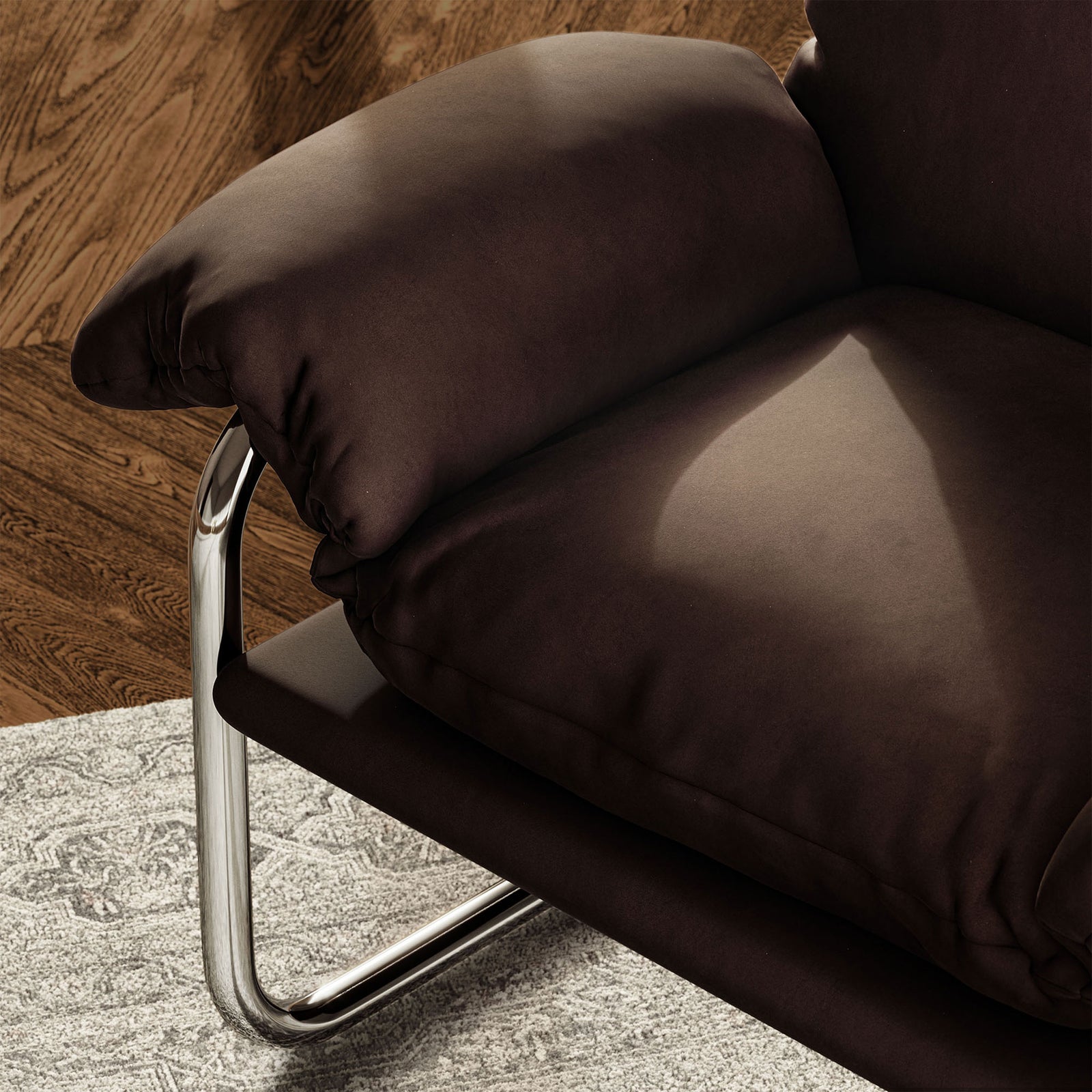Rich chocolate velvet contrasts with the chrome base for a cozy, refined lounge vibe || EEI-7181-CHB || detail_room