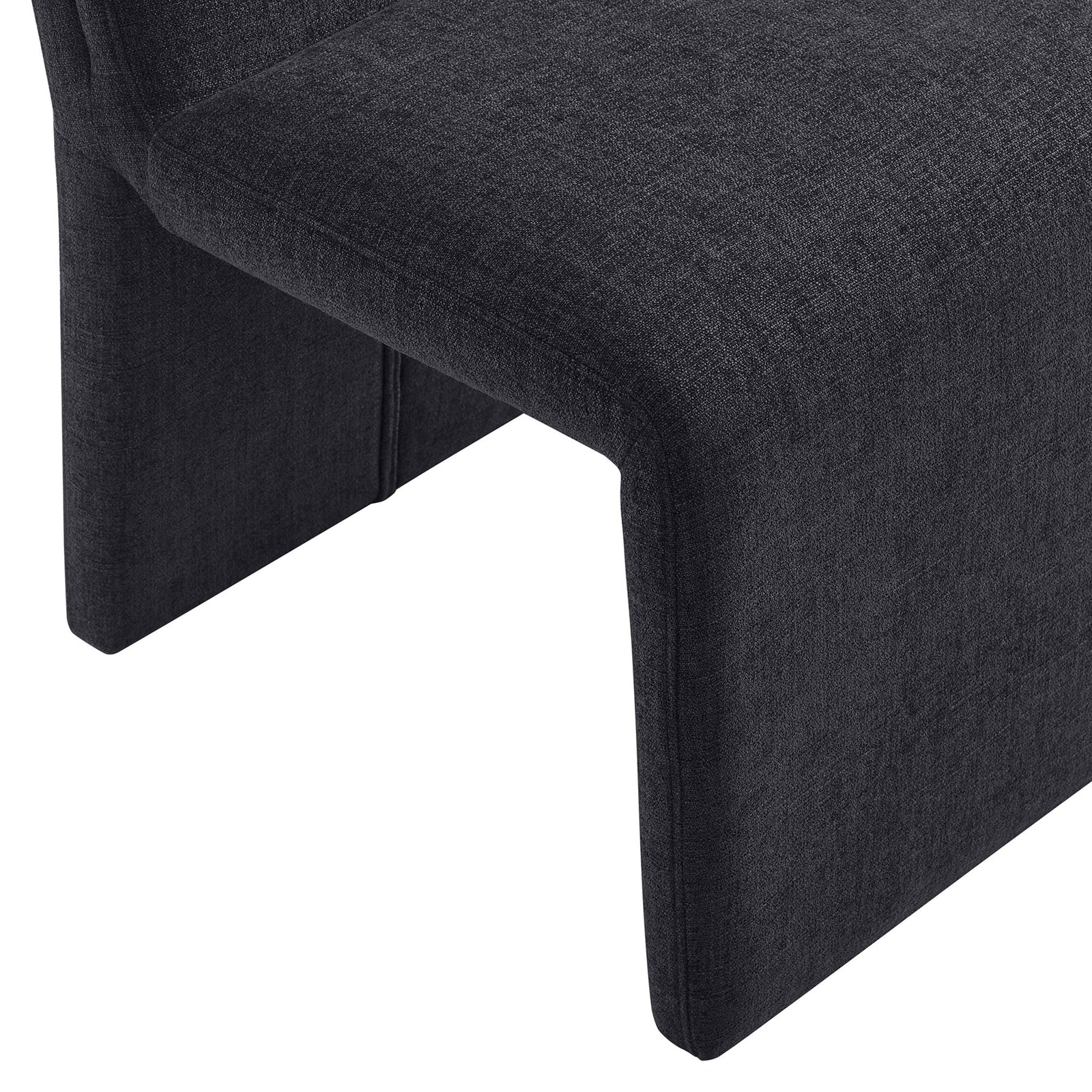 Upholstered base of the ebony dining chair with soft curves and tailored seams || EEI-7185-EBO || leg_studio