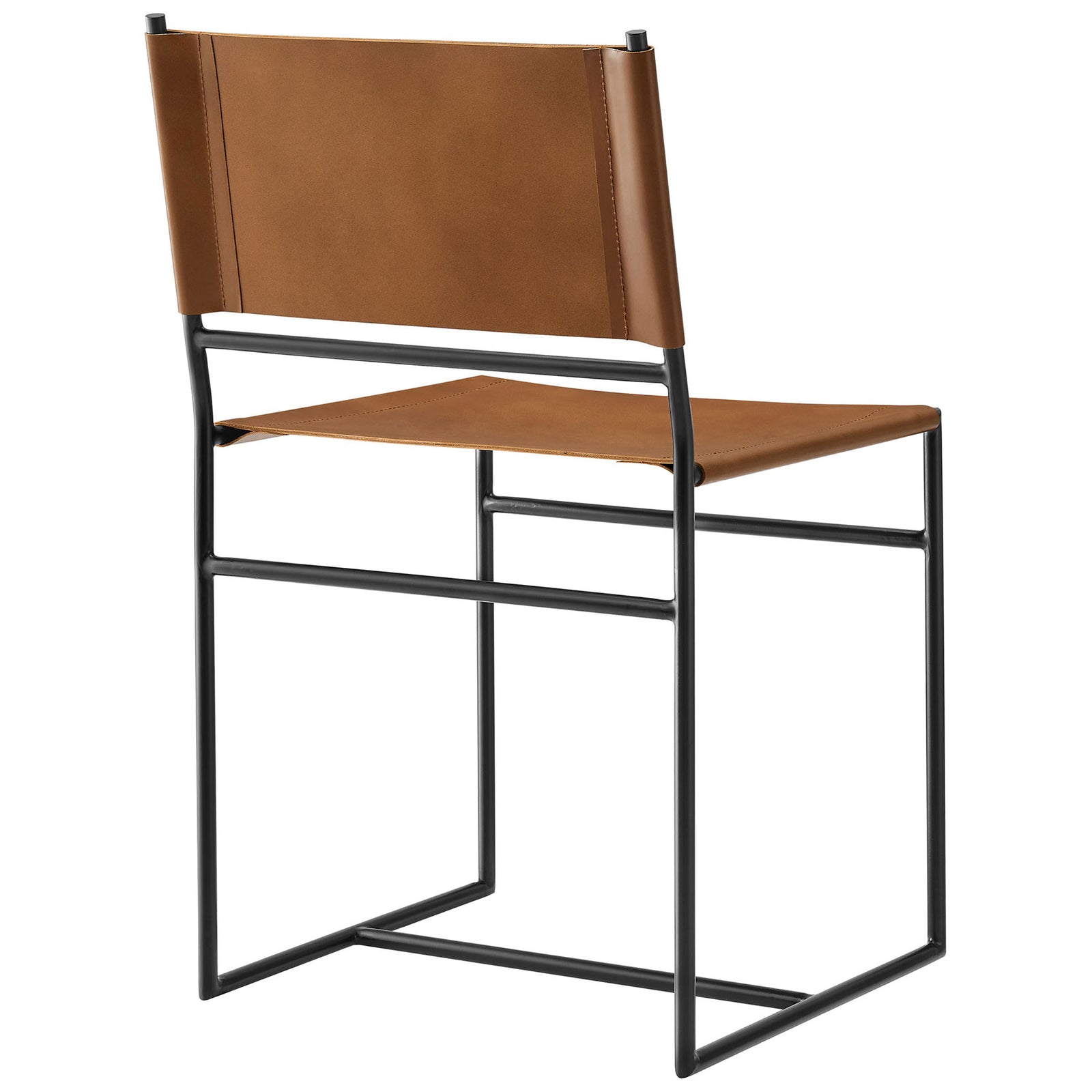 Tan leather backrest wraps a minimalist black metal frame for a refined modern dining chair || EEI-7196-TAN || back_angle_studio