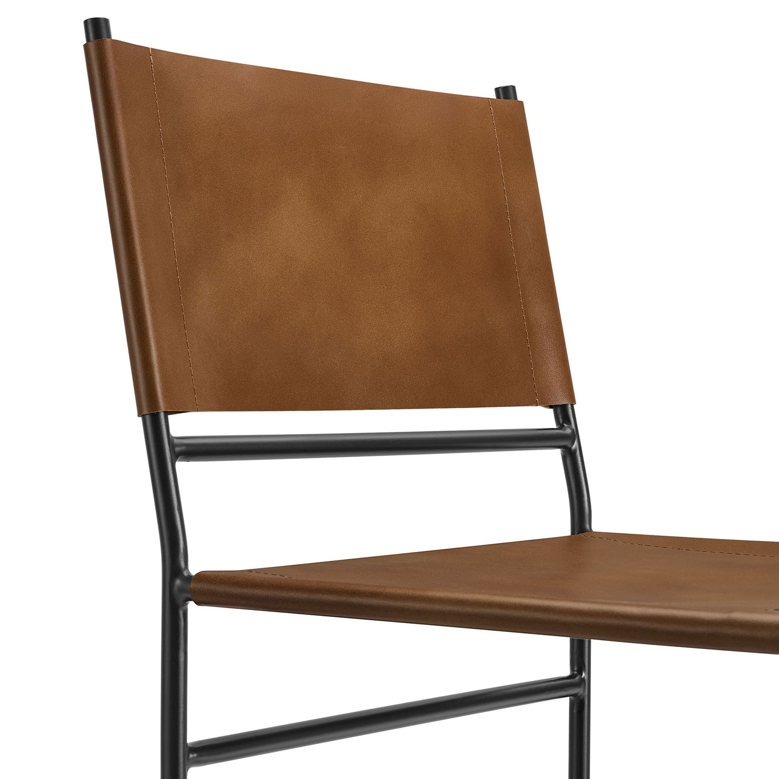 Smooth tan leather upholstery with neat topstitching accents the modern sling backrest and seat || EEI-7196-TAN || detail_studio