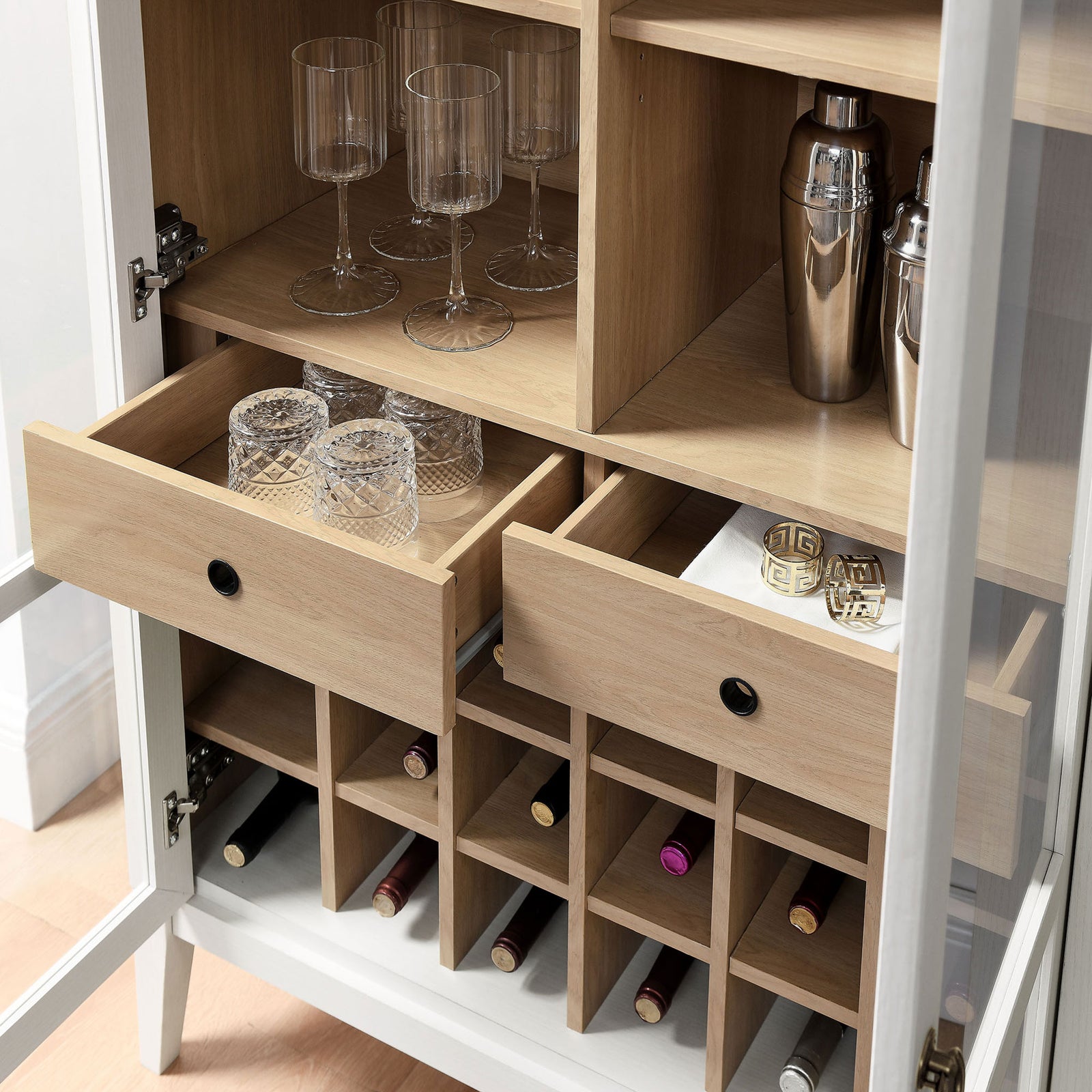 Entertaining made easy with hanging stemware rack, organized drawers, and bottle storage || EEI-7203-IVO-OAK || storage_open_room