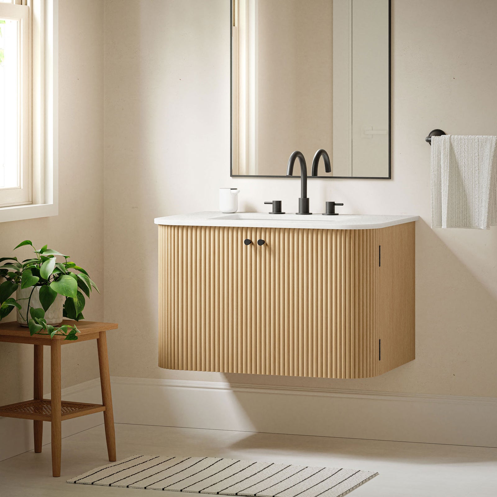 Floating vanity with seamless marble top and minimalist fluted face || EEI-7208-NAT || front_angle_room