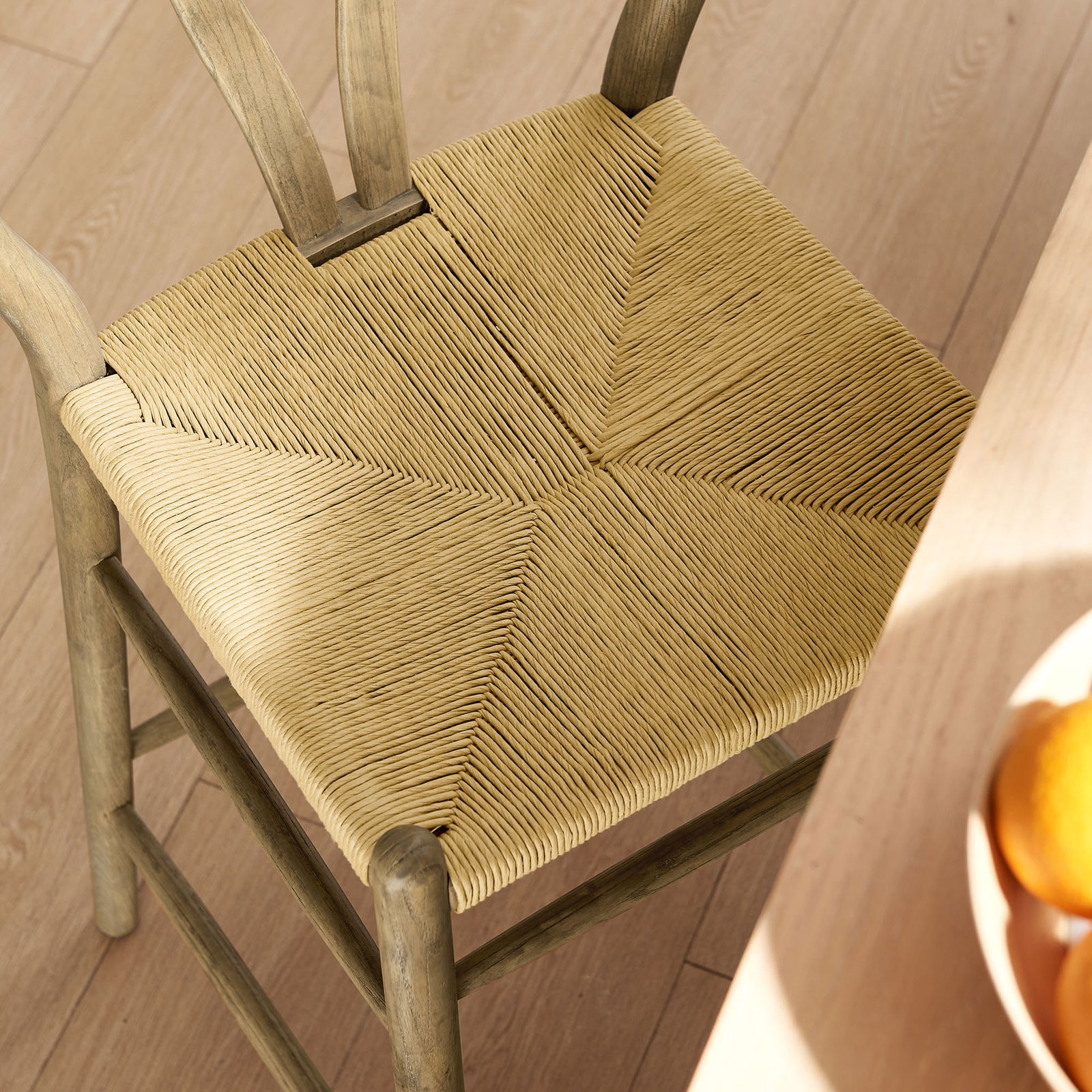 Woven seat pattern delivers textural depth and supportive comfort || EEI-7210-GRY || detail_room