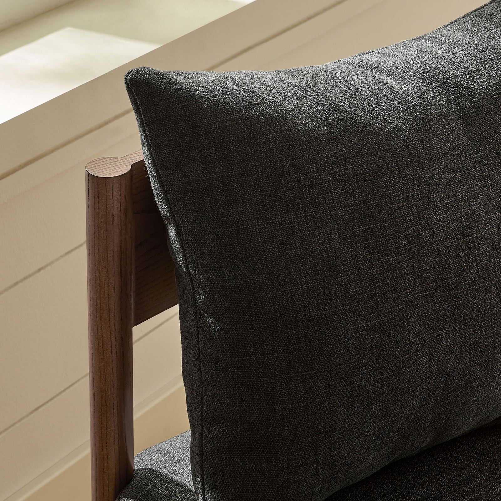 Charcoal slub weave back pillow on Remington chair bringing soft comfort to a bright interior. || EEI-7242-CHA || detail_room