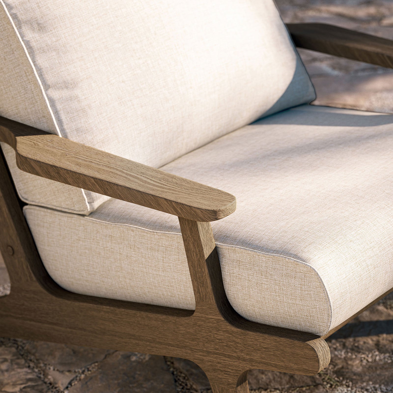 Saratoga pebble chair armrest and cushion styled with a textured outdoor throw pillow || EEI-7248-WGR-PEB || detail_room