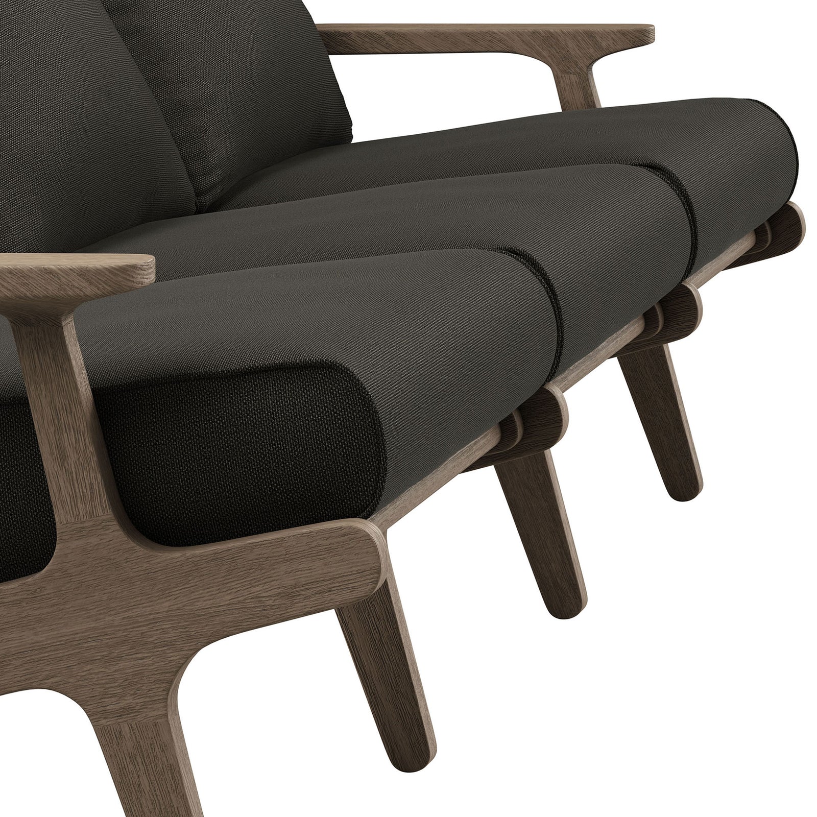 Teak sofa seat detailing with rounded front edge, textured upholstery, and smooth sculpted arm || EEI-7249-WGR-FLI || detail_studio