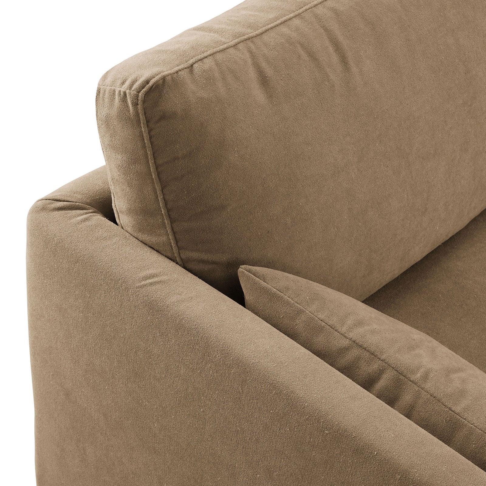 Linen-blend upholstery with French piping and plush cushion on the almond slipcovered sofa. || EEI-7260-ALM || detail_studio