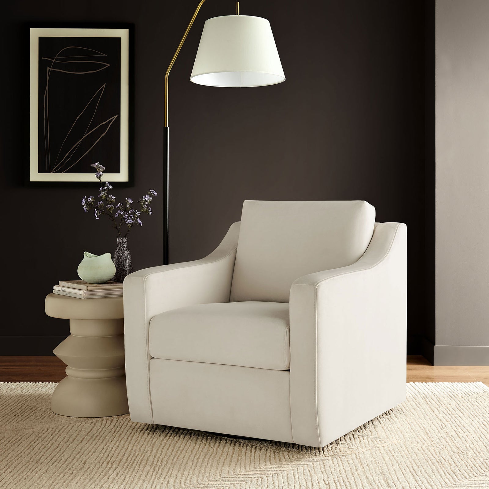 Elevated comfort with a floating swivel base and inviting cushions for a polished living room look. || EEI-7282-ALA || front_room
