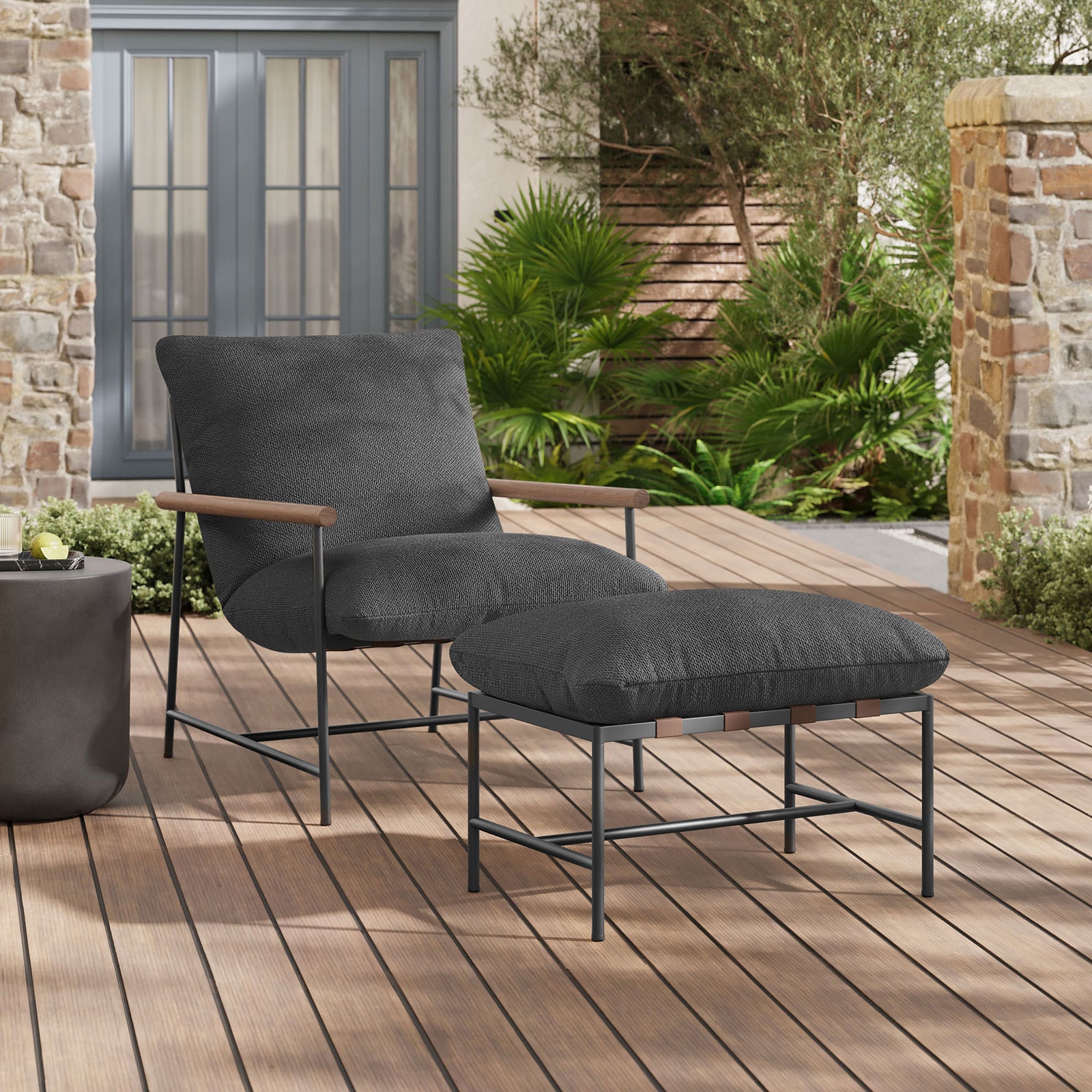 Charcoal boucle lounge chair and ottoman creating a cozy retreat on a modern outdoor deck || EEI-7292-CHA || front_angle_room