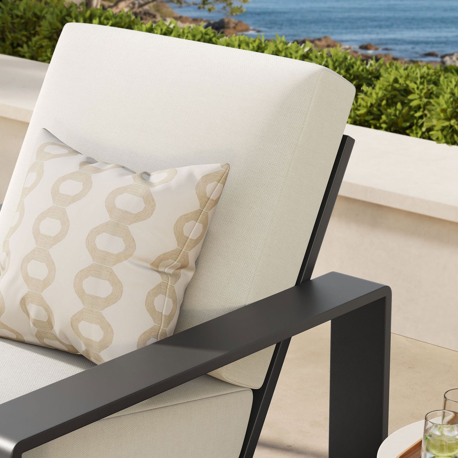 Cream cushion and charcoal arm detail bring modern contrast to an inviting outdoor retreat || EEI-7300-CRE-GRY || detail_room
