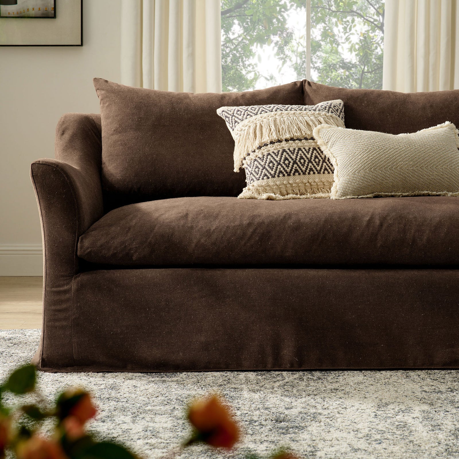 Styled living room scene featuring the cocoa Somerset sofa layered with textured accent pillows || EEI-7310-COA || detail_room