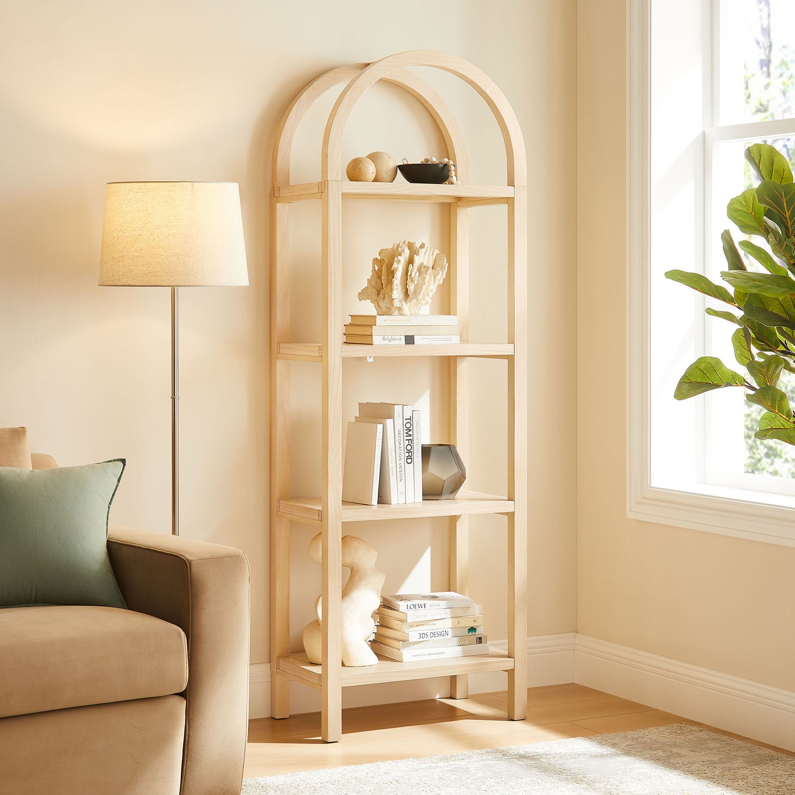 Elevates a cozy living room with its airy arch and open shelving for decor and books || EEI-7316-NAT || front_angle_room