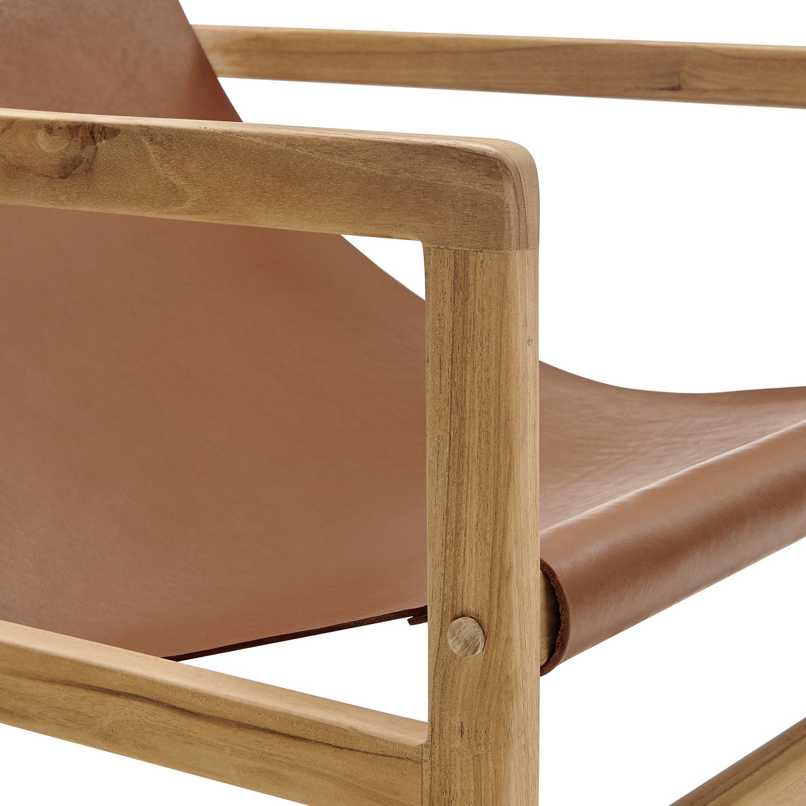 Rounded teak arm with visible joinery and a taut leather sling seat || EEI-7324-CSN || detail_studio