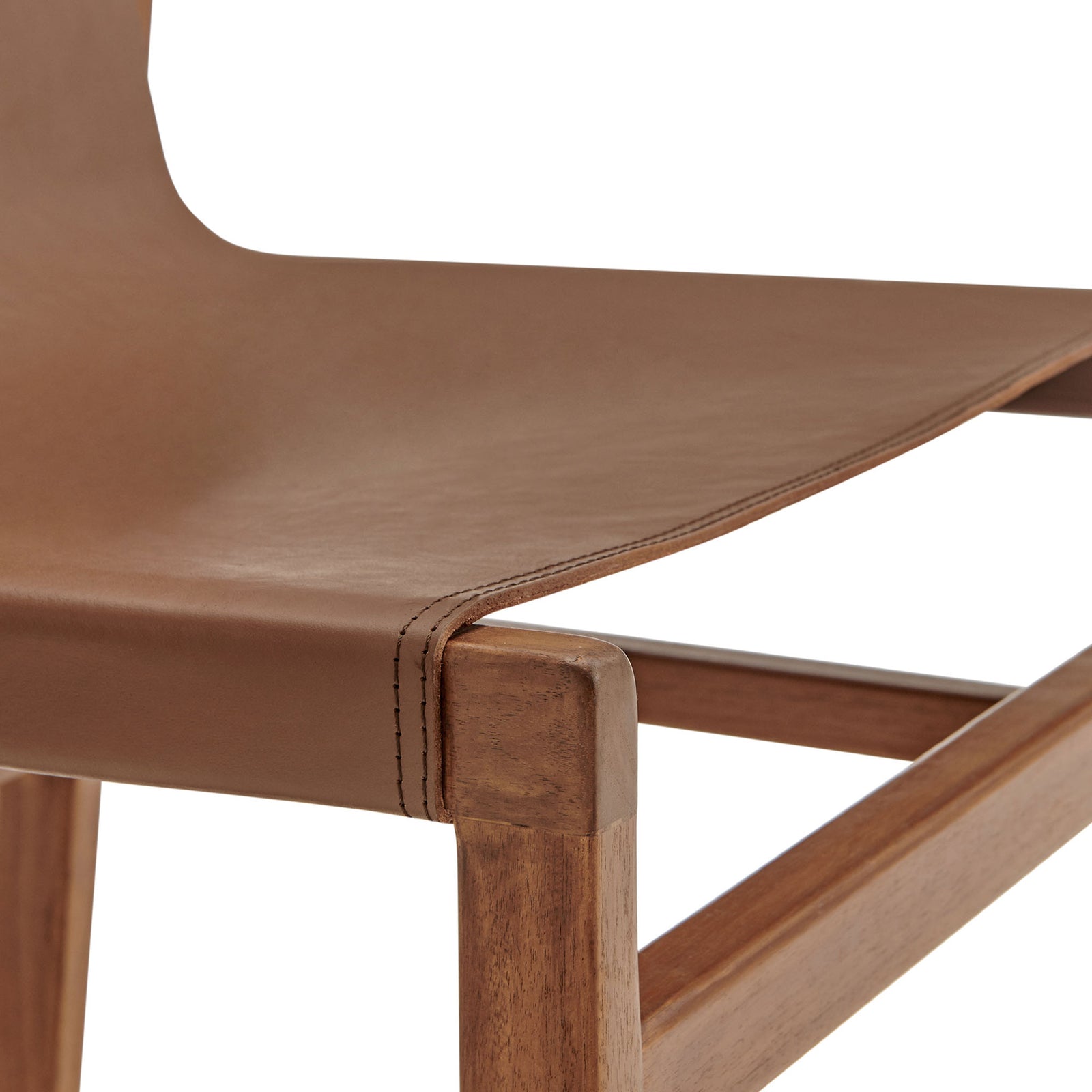 Front seat edge features tailored stitching and warm teak corner detail || EEI-7326-NUT || detail_studio
