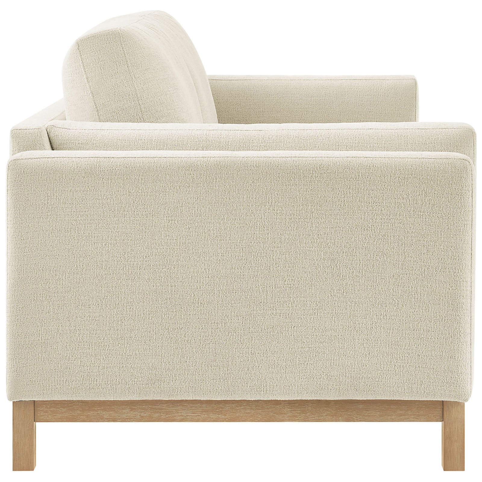 Roscoe sofa showcasing thick back cushions, layered arm design, and slim wood legs in a natural finish || EEI-7327-IVO || side_studio