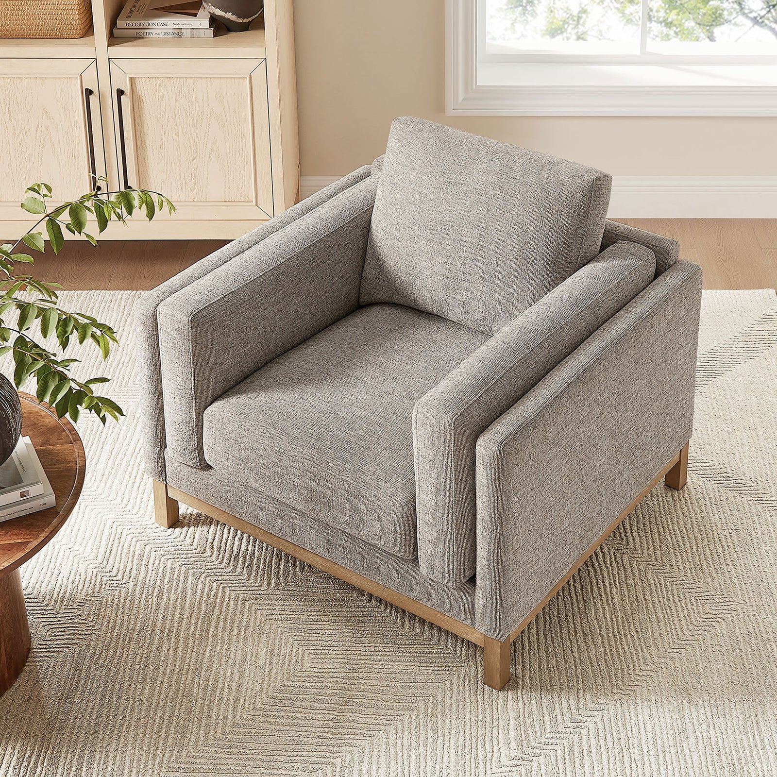 Generous cushions and supportive arms create a cozy lounge spot in versatile pewter fabric. || EEI-7329-PEW || top_angle_room