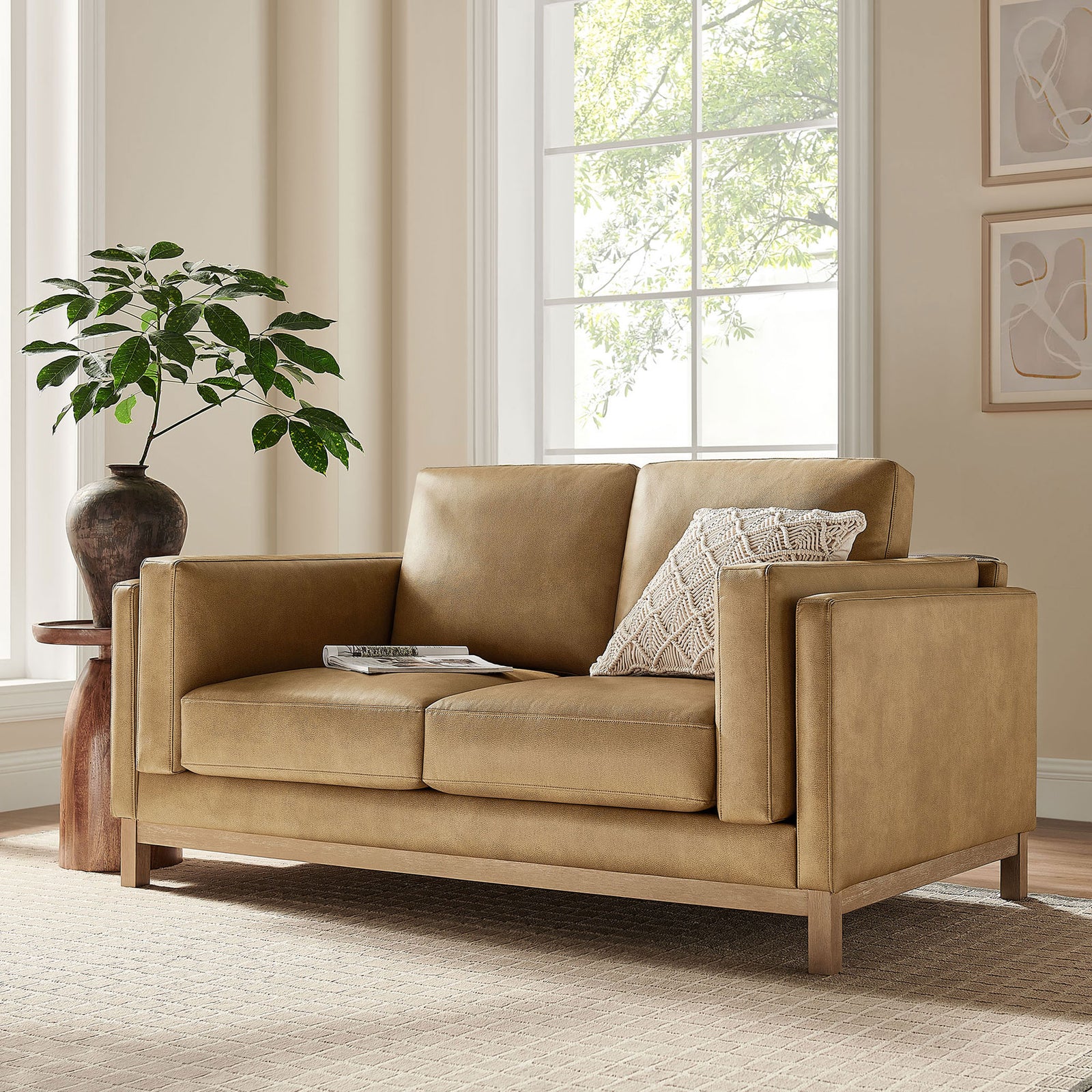 Roscoe toast vegan leather loveseat styled in a bright living room with simple modern decor || EEI-7336-TST || front_angle_room